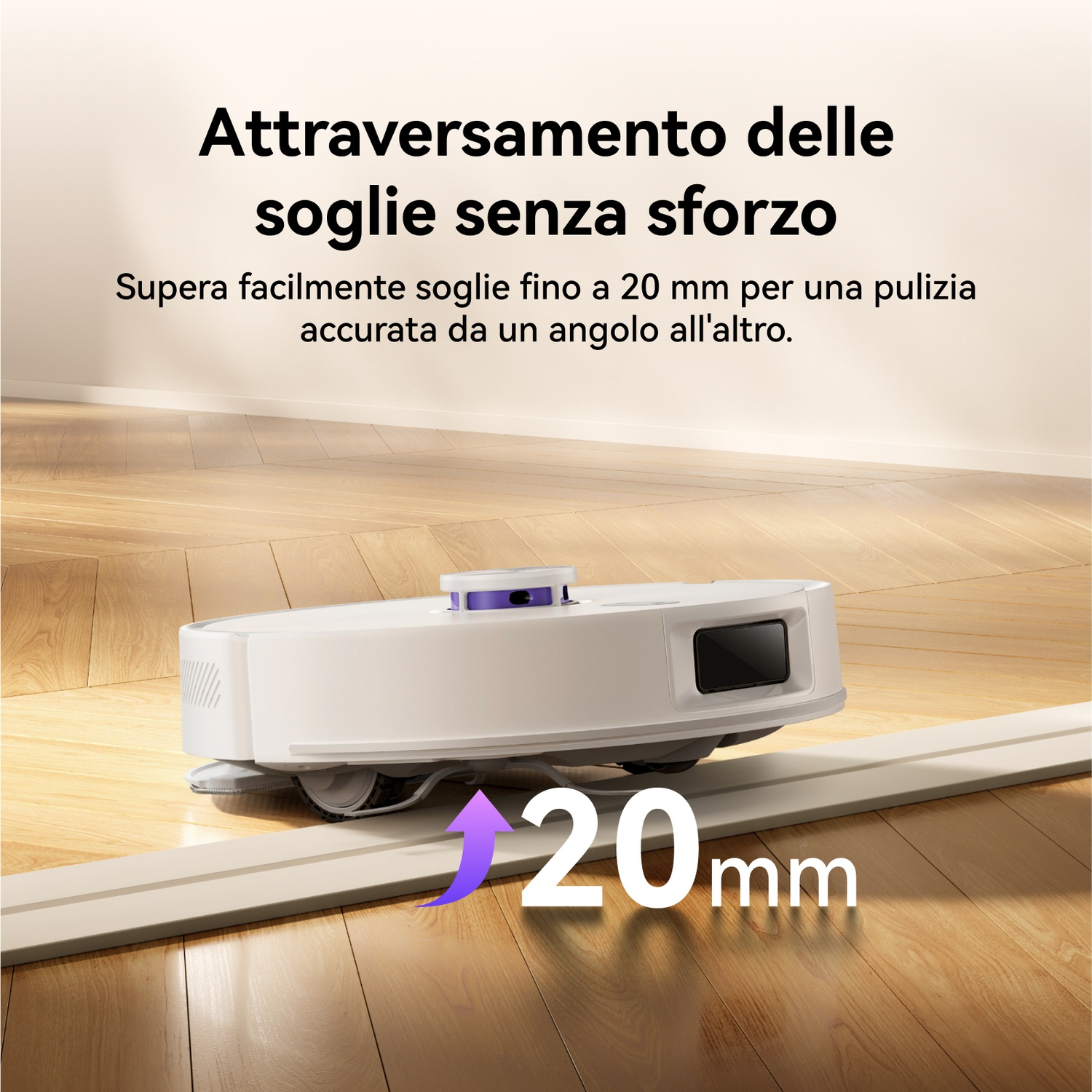 Un robot aspirapolvere bianco supera senza sforzo una soglia di 20 mm.