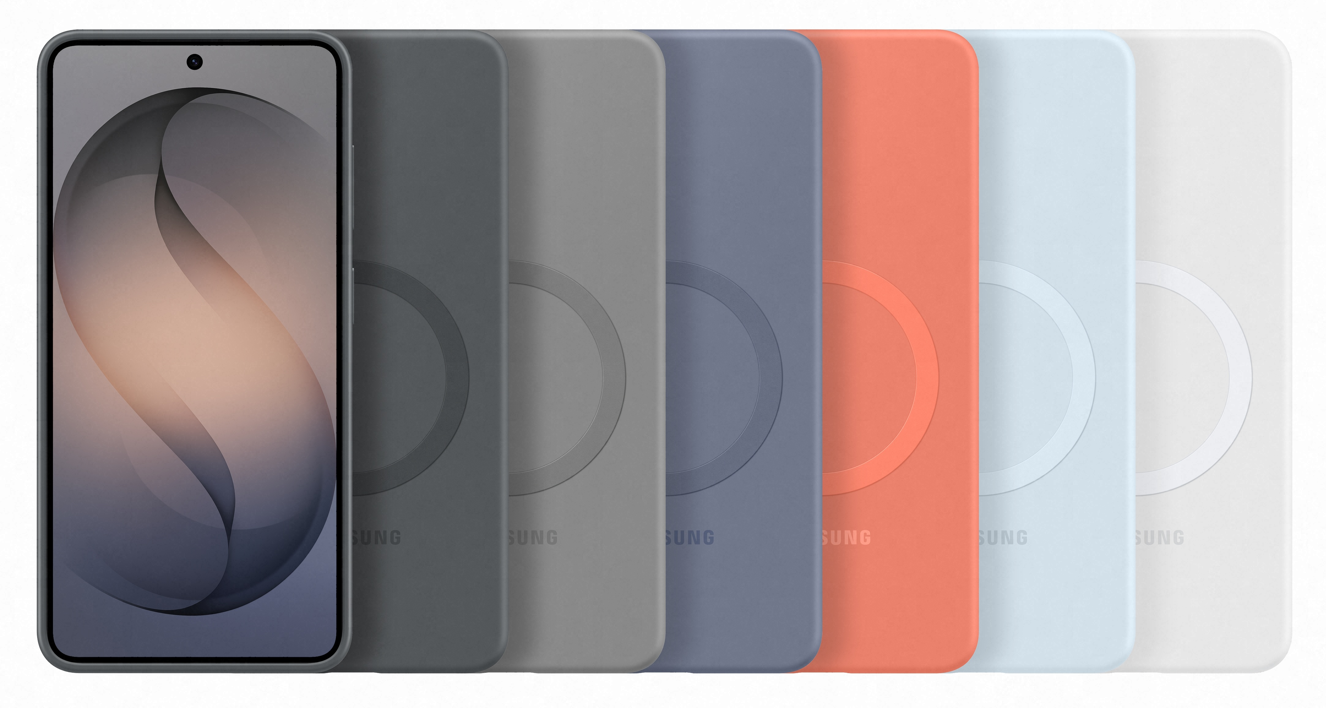 Smartfon i sześć etui na telefon w różnych kolorach.