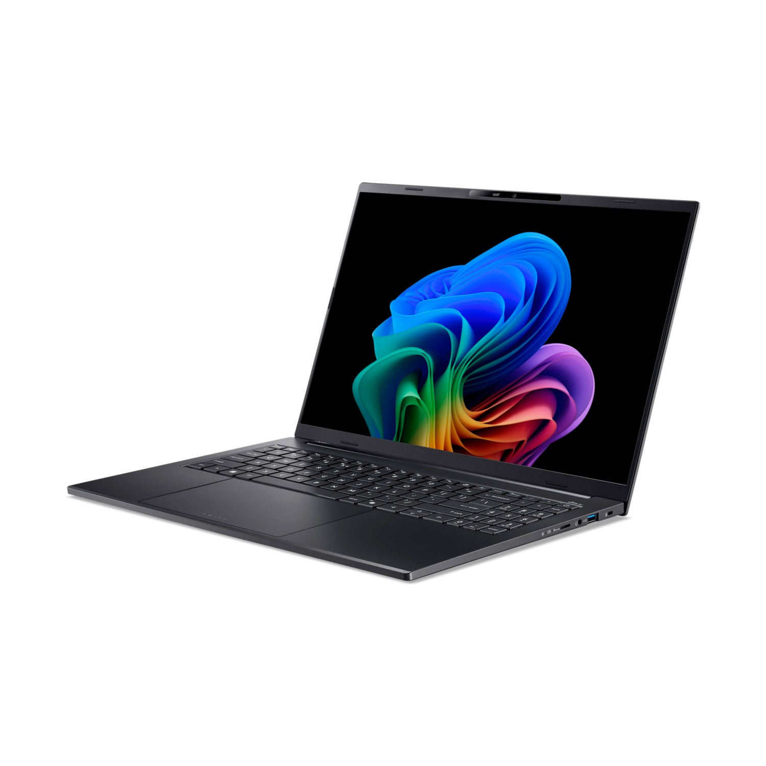Un laptop scuro con uno sfondo astratto colorato sullo schermo.