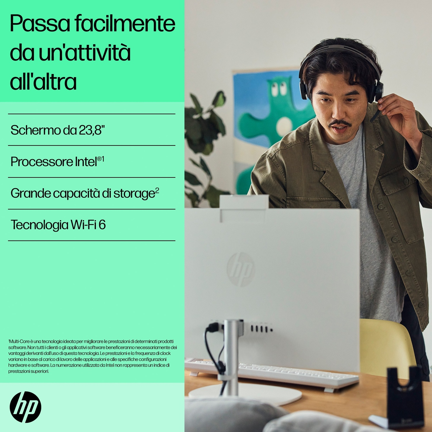Uomo con cuffie in ufficio davanti a PC All-in-One HP con testo verde.