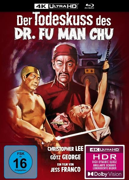 Dr. Fu Manchu hält ein Messer über einer gefesselten Frau. Ein Mann steht daneben.