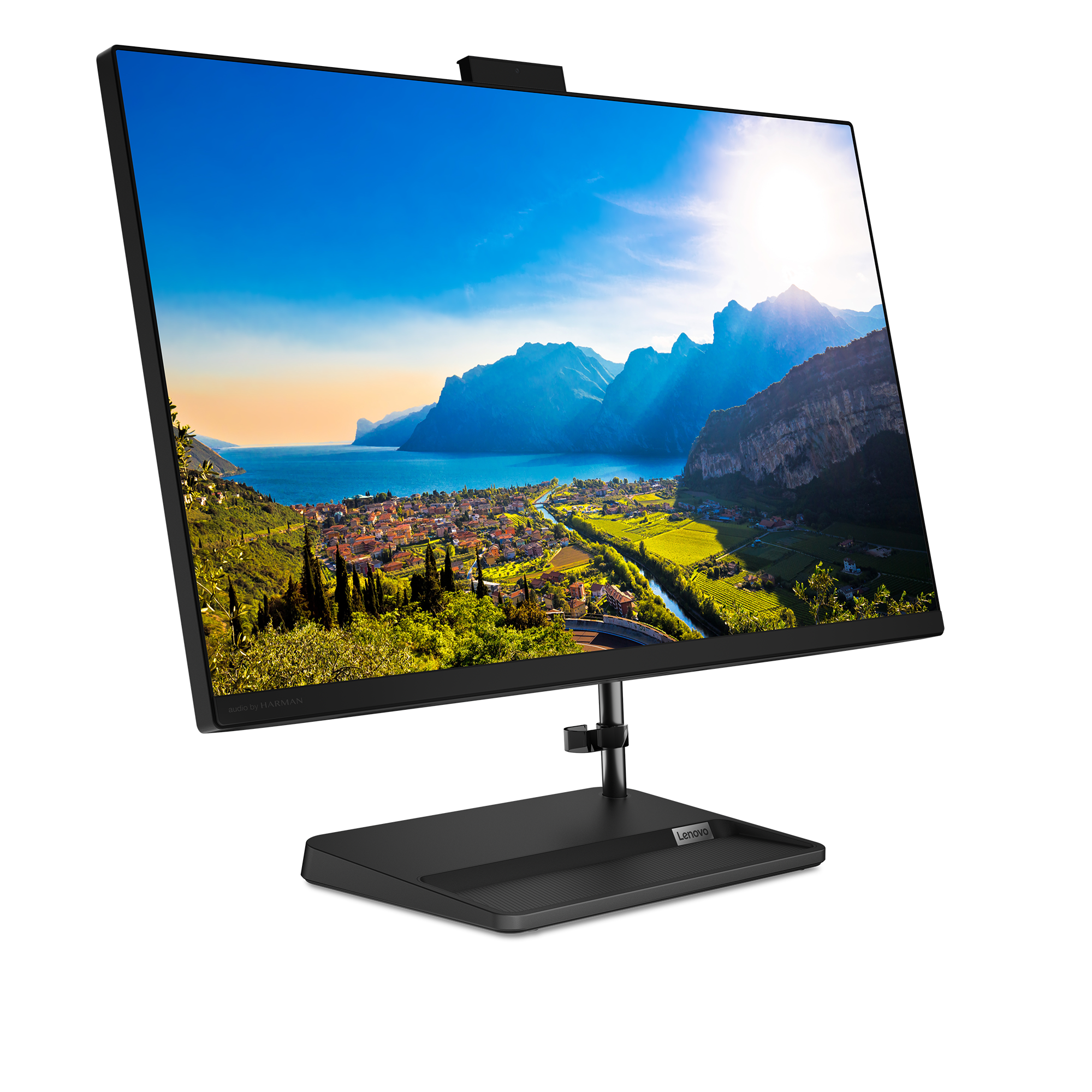 Ein moderner Monitor mit einem Bild eines Dorfes am See und Bergen.