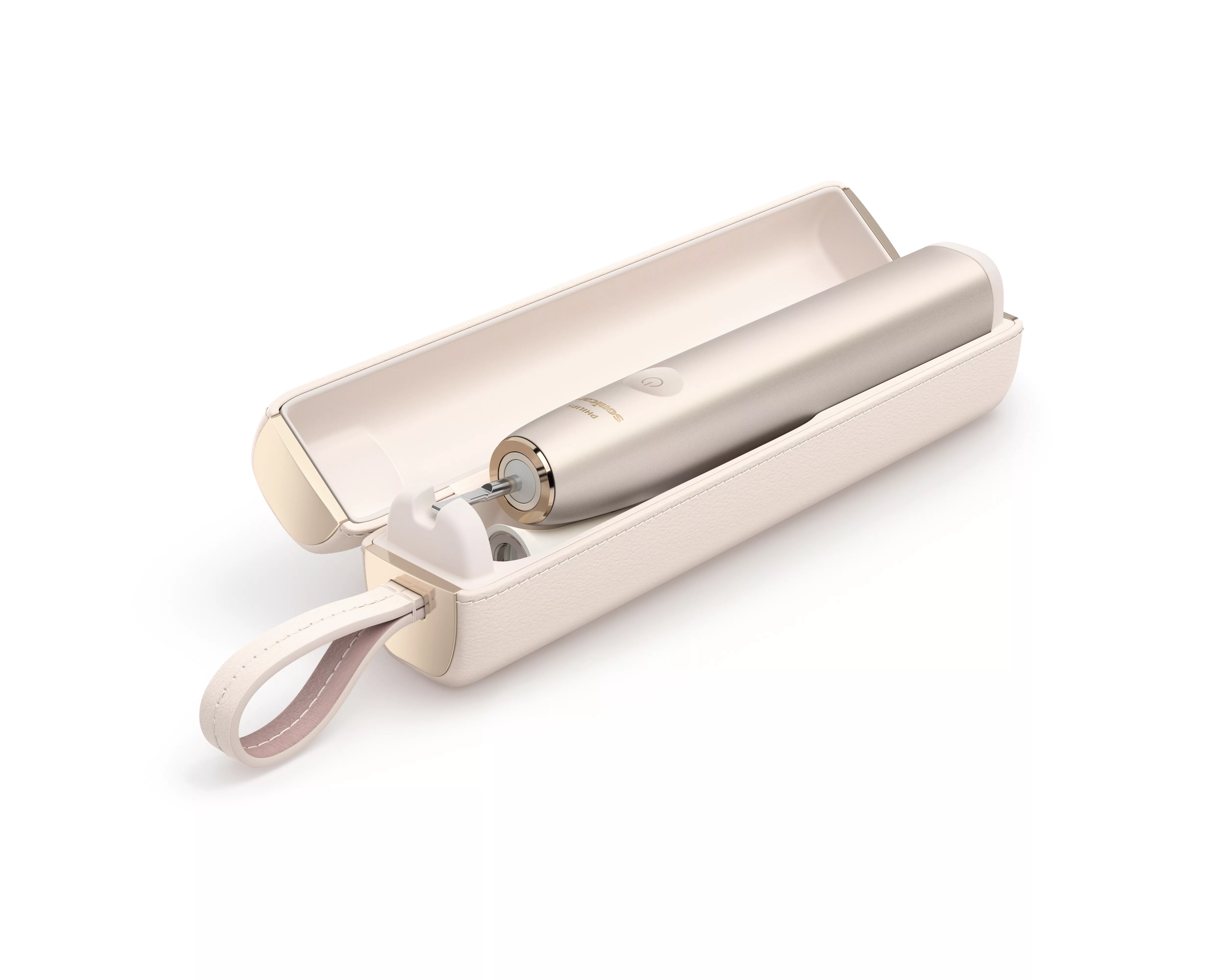 Złota szczoteczka elektryczna z etui ładującym i paskiem na białym tle.