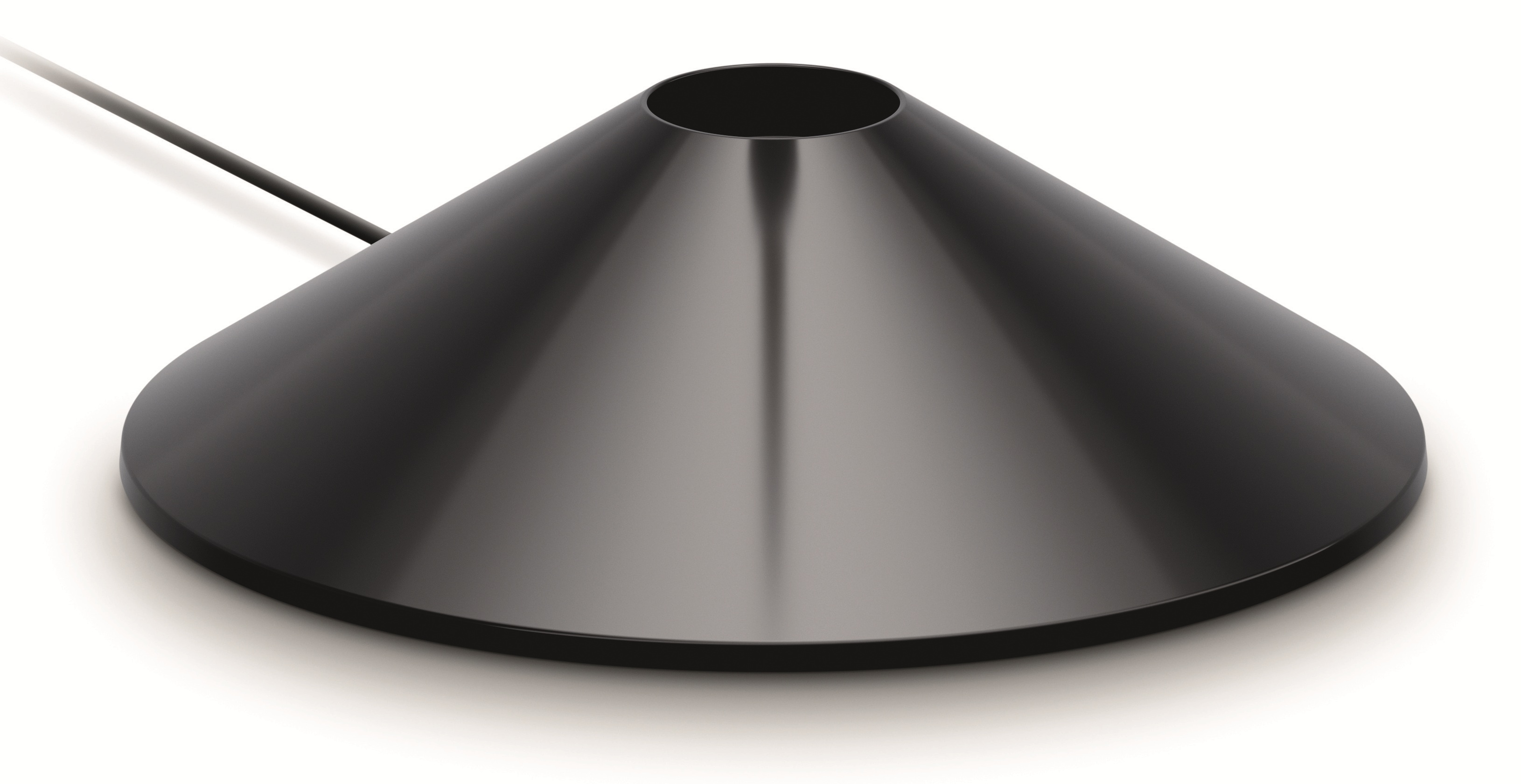 Czarny, stożkowy przedmiot z kablem, na białym tle.