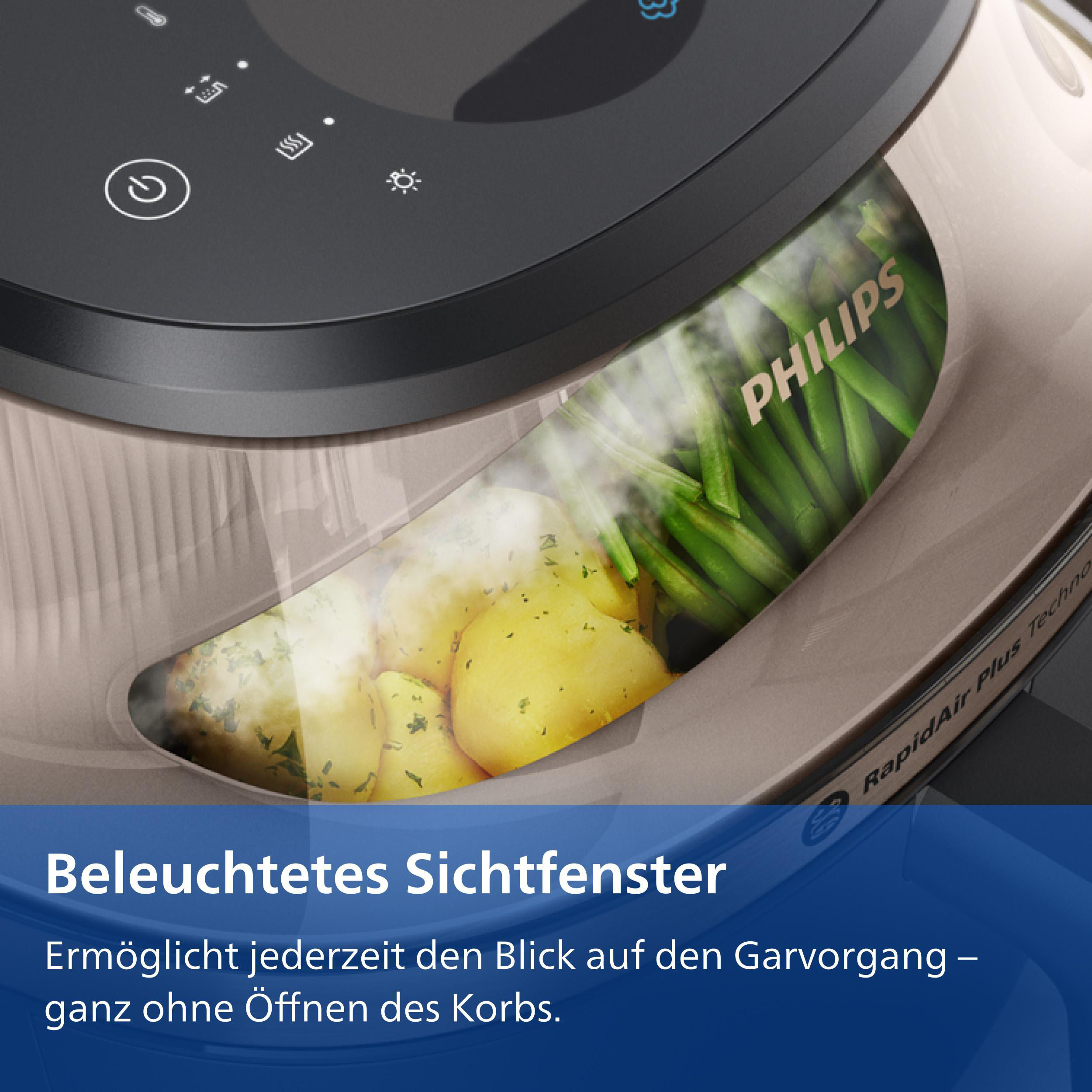 Ein beleuchtetes Sichtfenster zeigt Kartoffeln und grüne Bohnen in einem Philips Airfryer.
