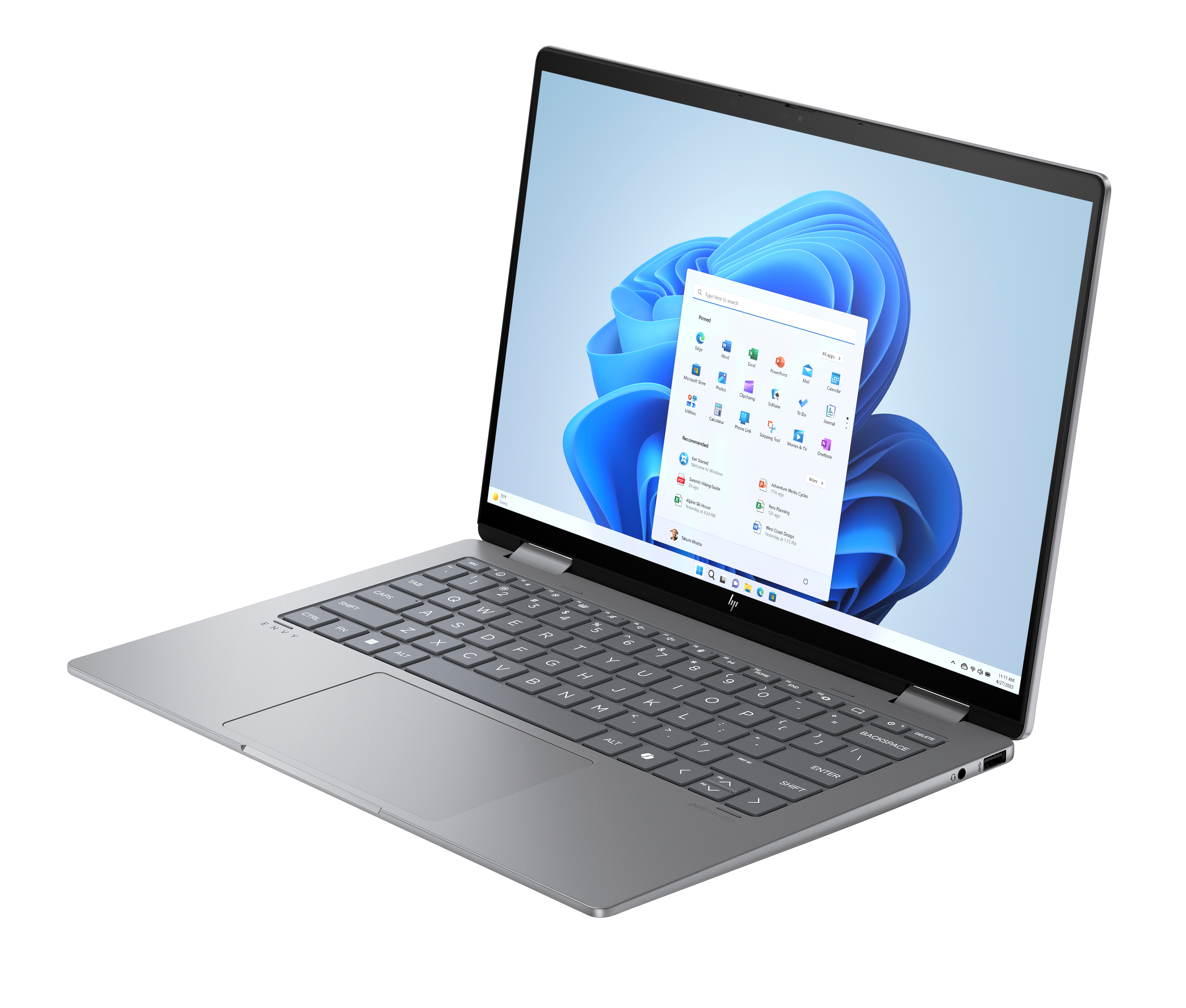 Srebrny laptop z otwartym ekranem, wyświetlający system Windows 11.