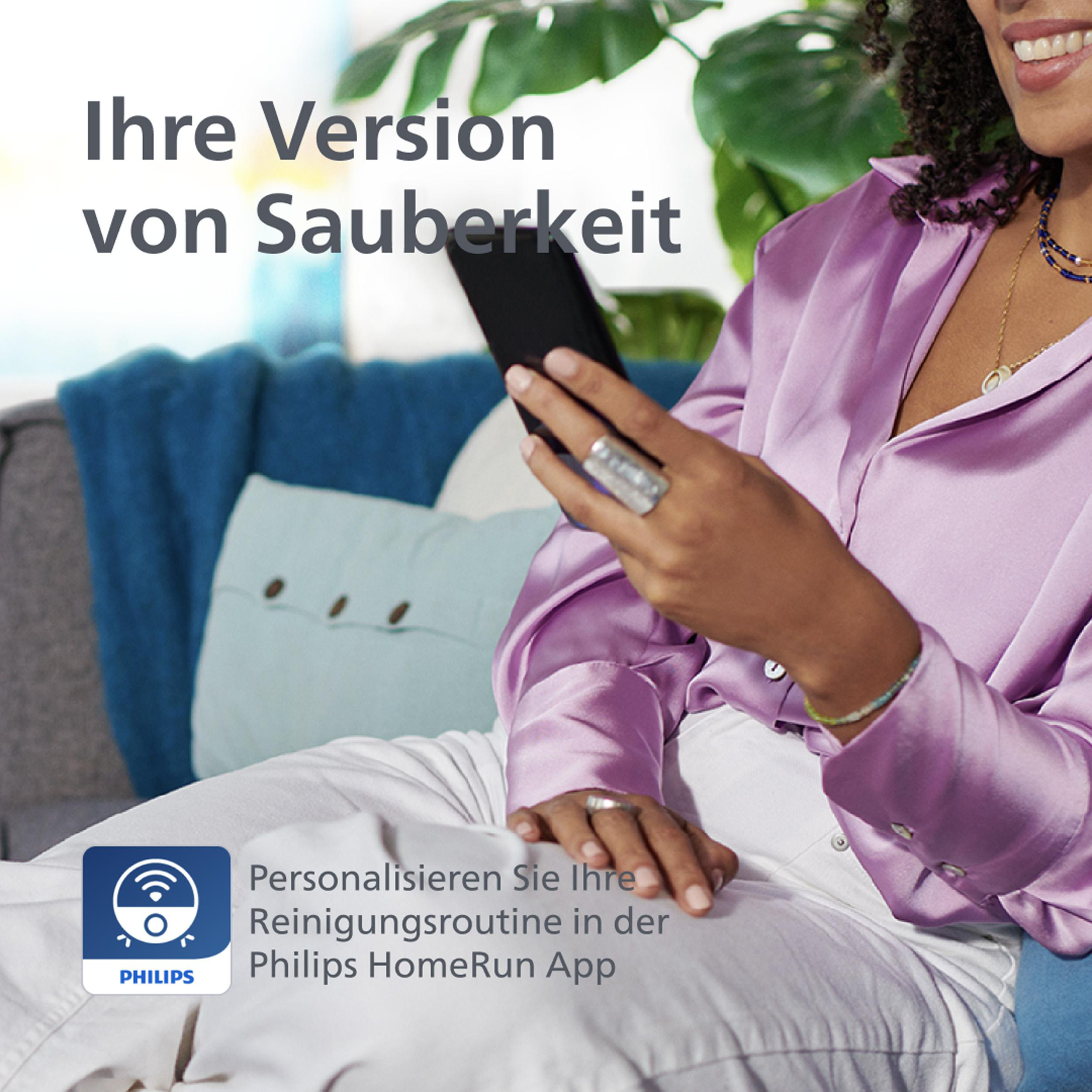 Frau mit Handy, Philips Logo und Text: Ihre Version von Sauberkeit.