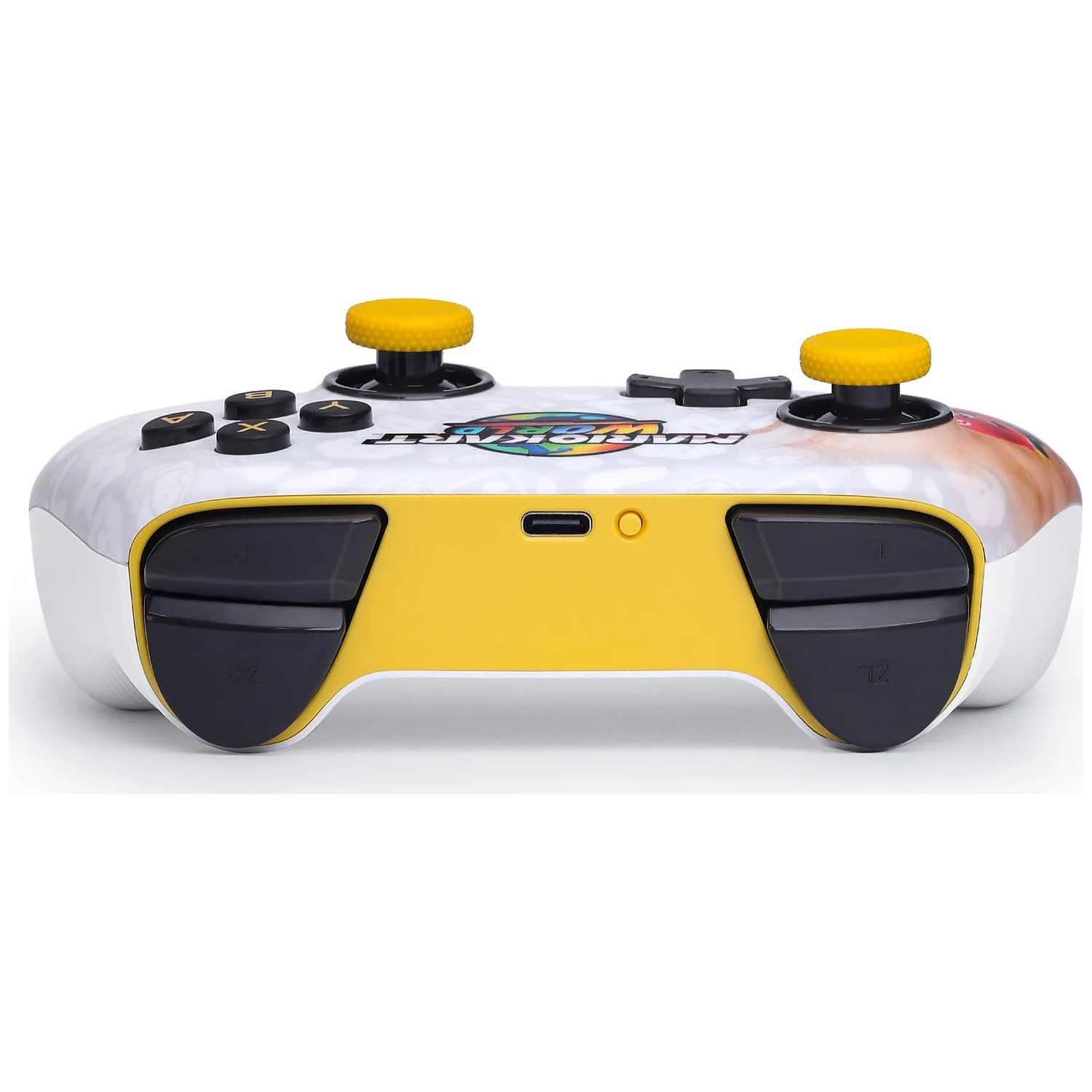 Une manette de jeu blanche et jaune avec des boutons noirs et des joysticks jaunes, avec un 