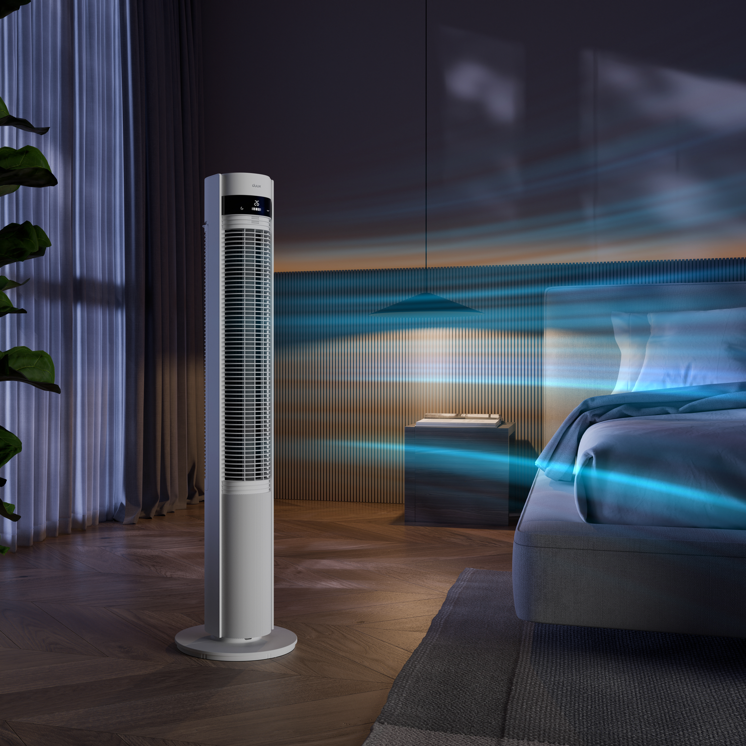 A sleek white tower fan in a bedroom, generating blue air currents.