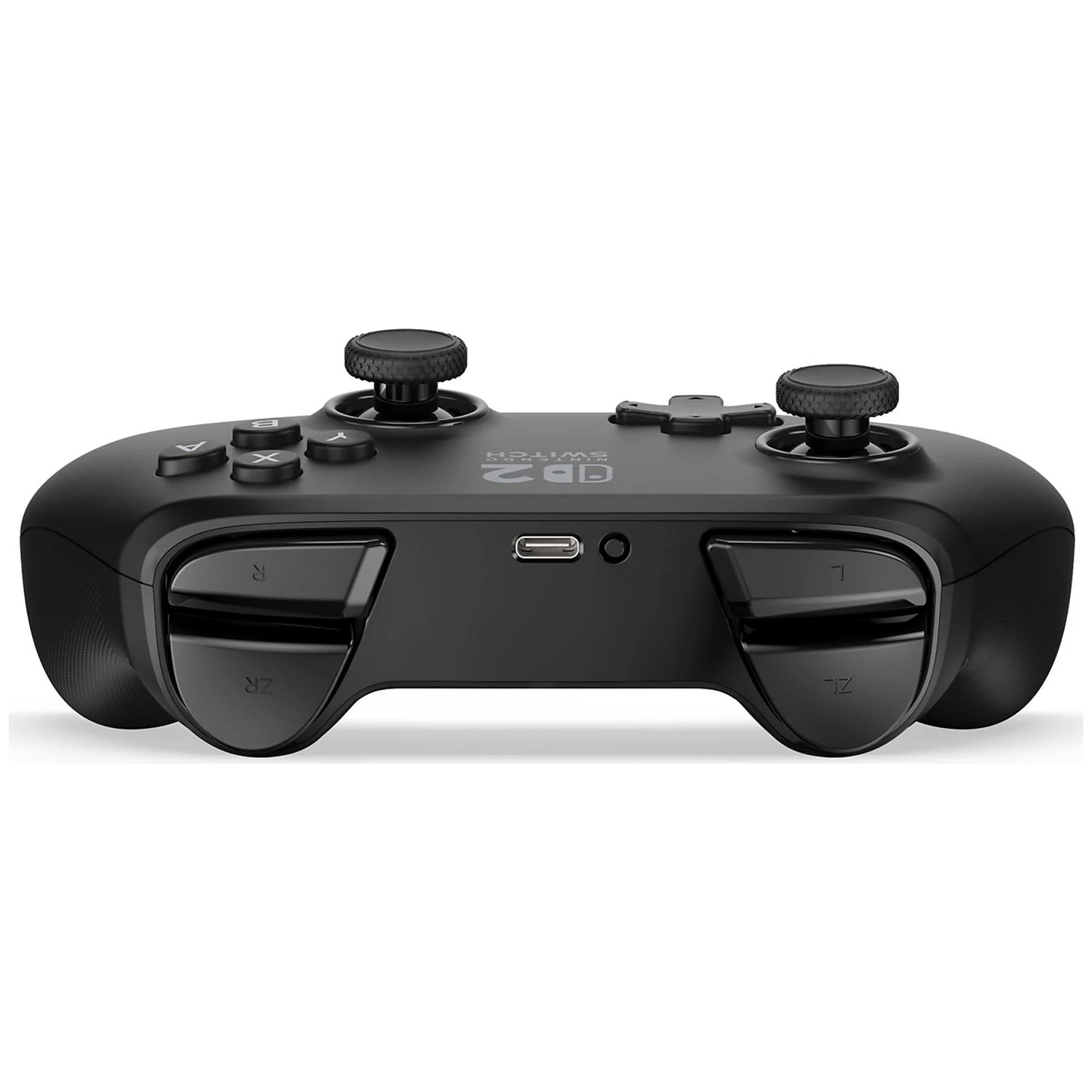 A black game controller featuring joysticks, buttons, and triggers.