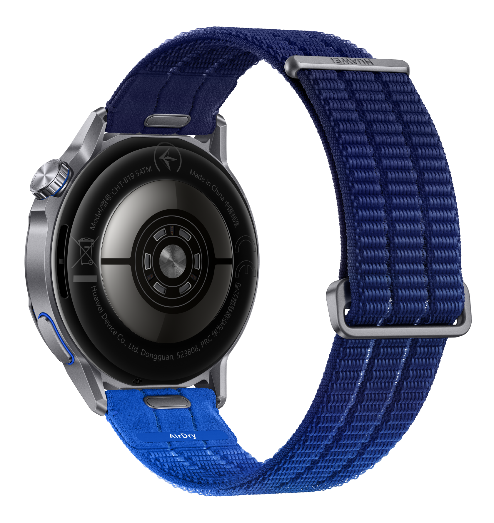 Tył smartwatcha z niebieską opaską materiałową. Metalowa obudowa z stykami ładowania.