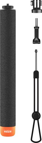 Czarny uchwyt z pomarańczową podstawą i akcesoriami.