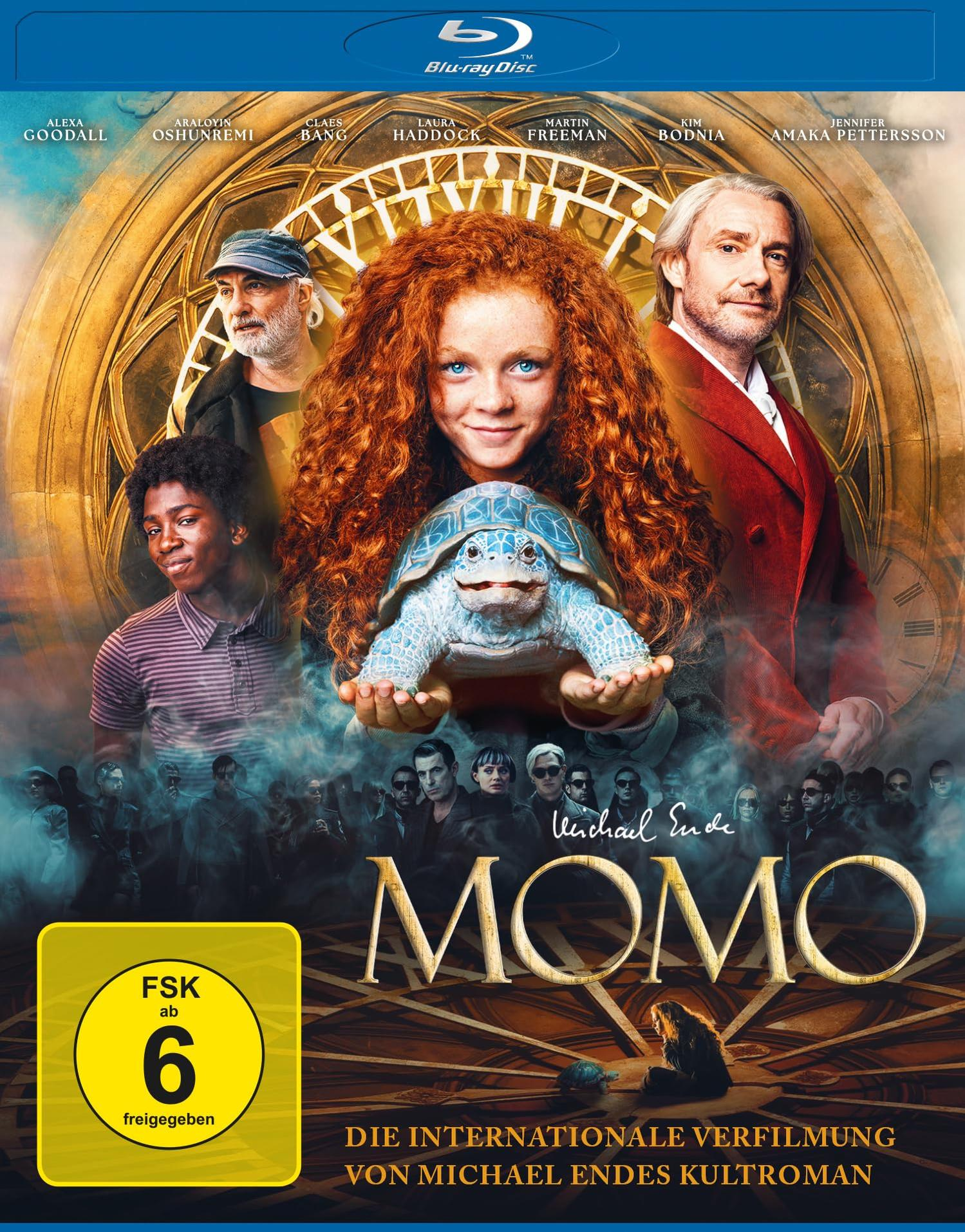 Filmplakat für MOMO mit Darstellern, einer Schildkröte und einer jungen Frau.