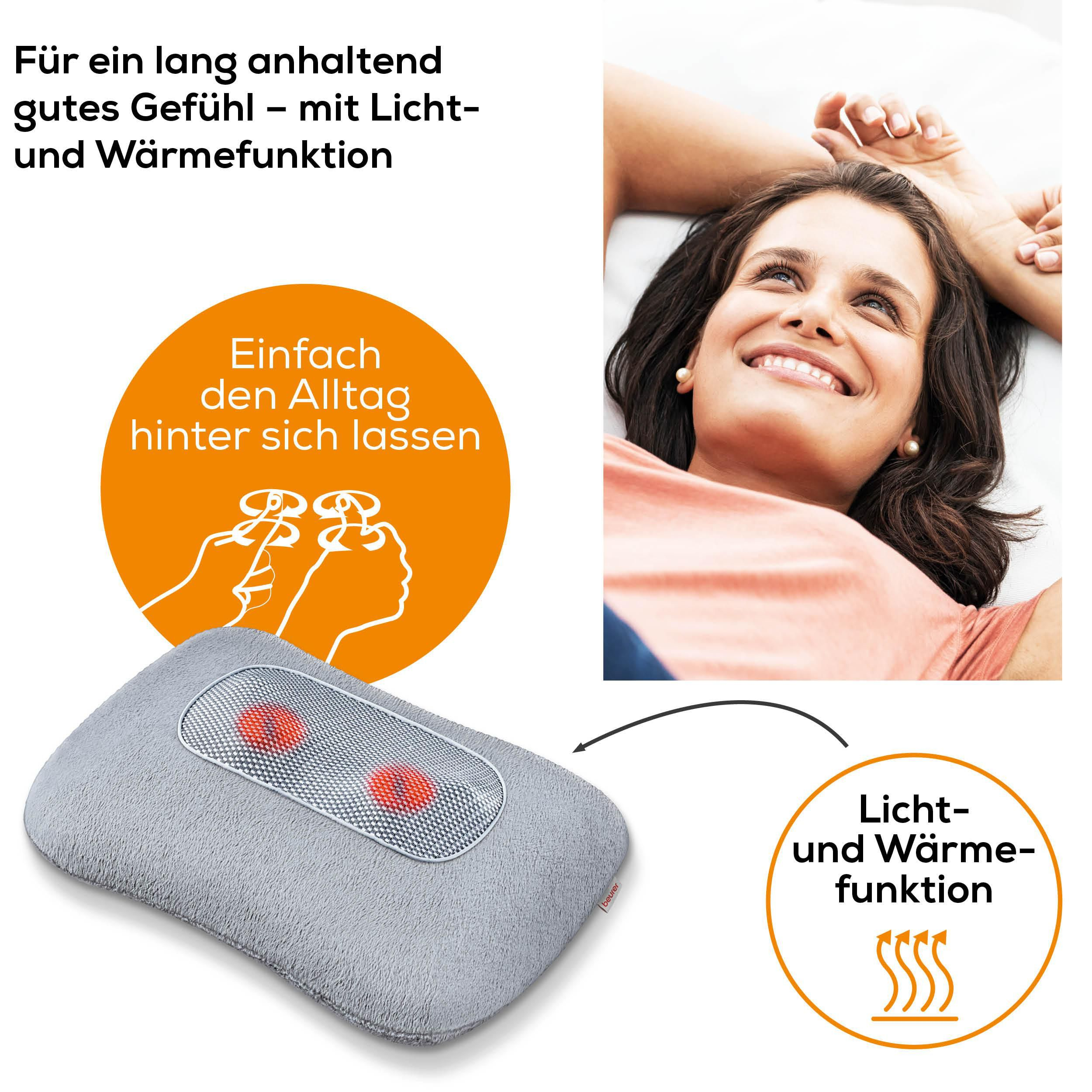 Graues Massagekissen mit zwei roten Massageköpfen, mit Frau.