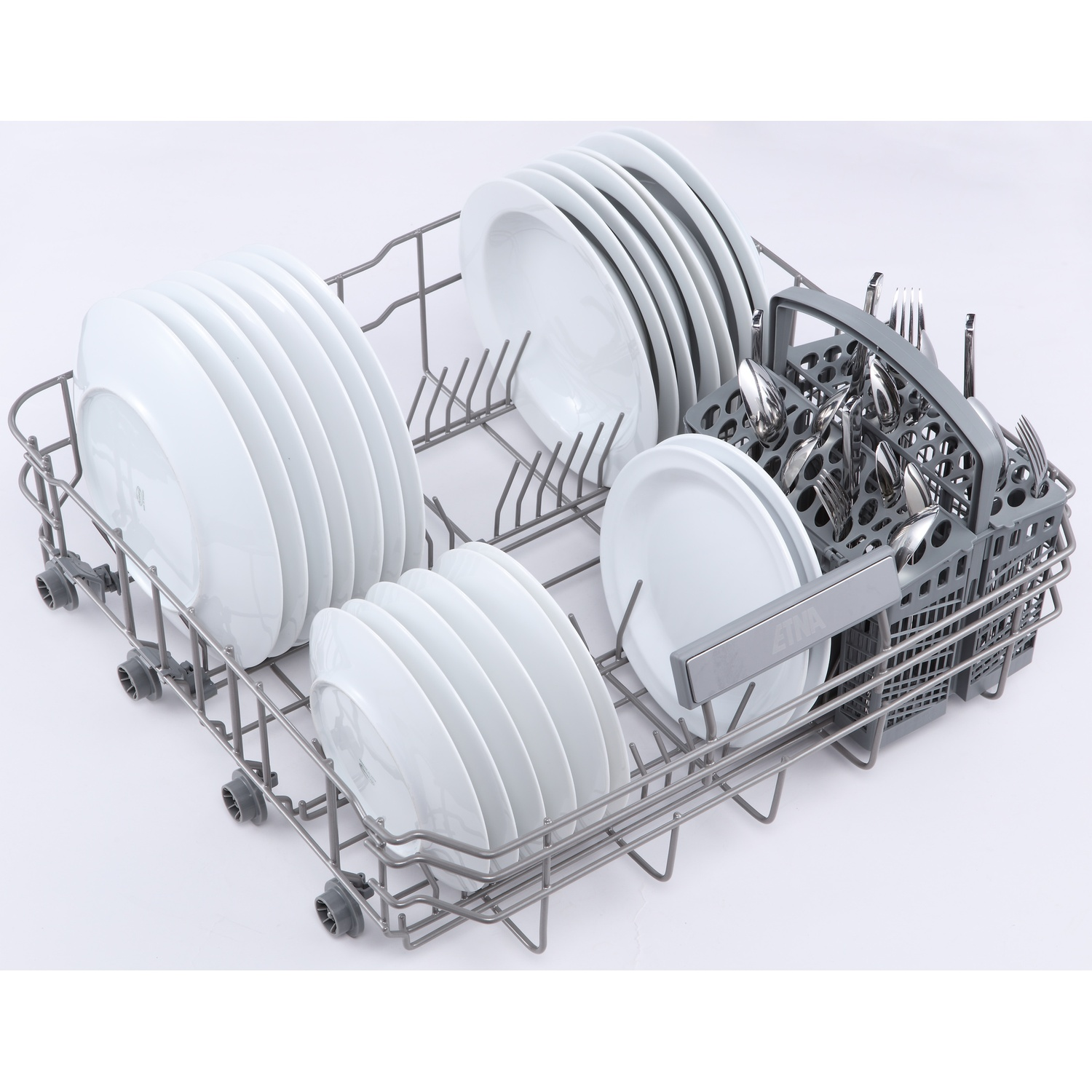 Dishwasher rack with white plates and cutlery, ready for washing.