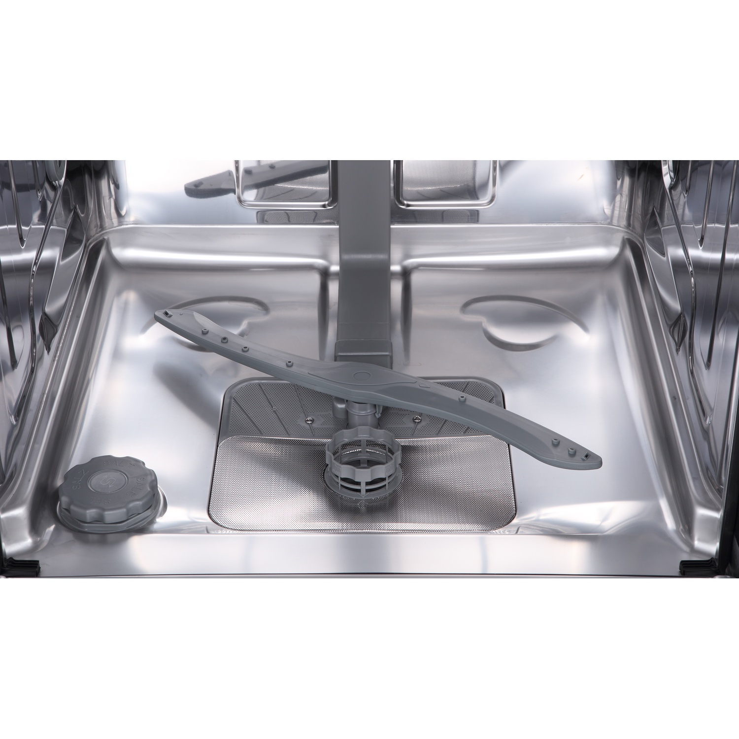 Interior of a dishwasher with spray arm and salt compartment.