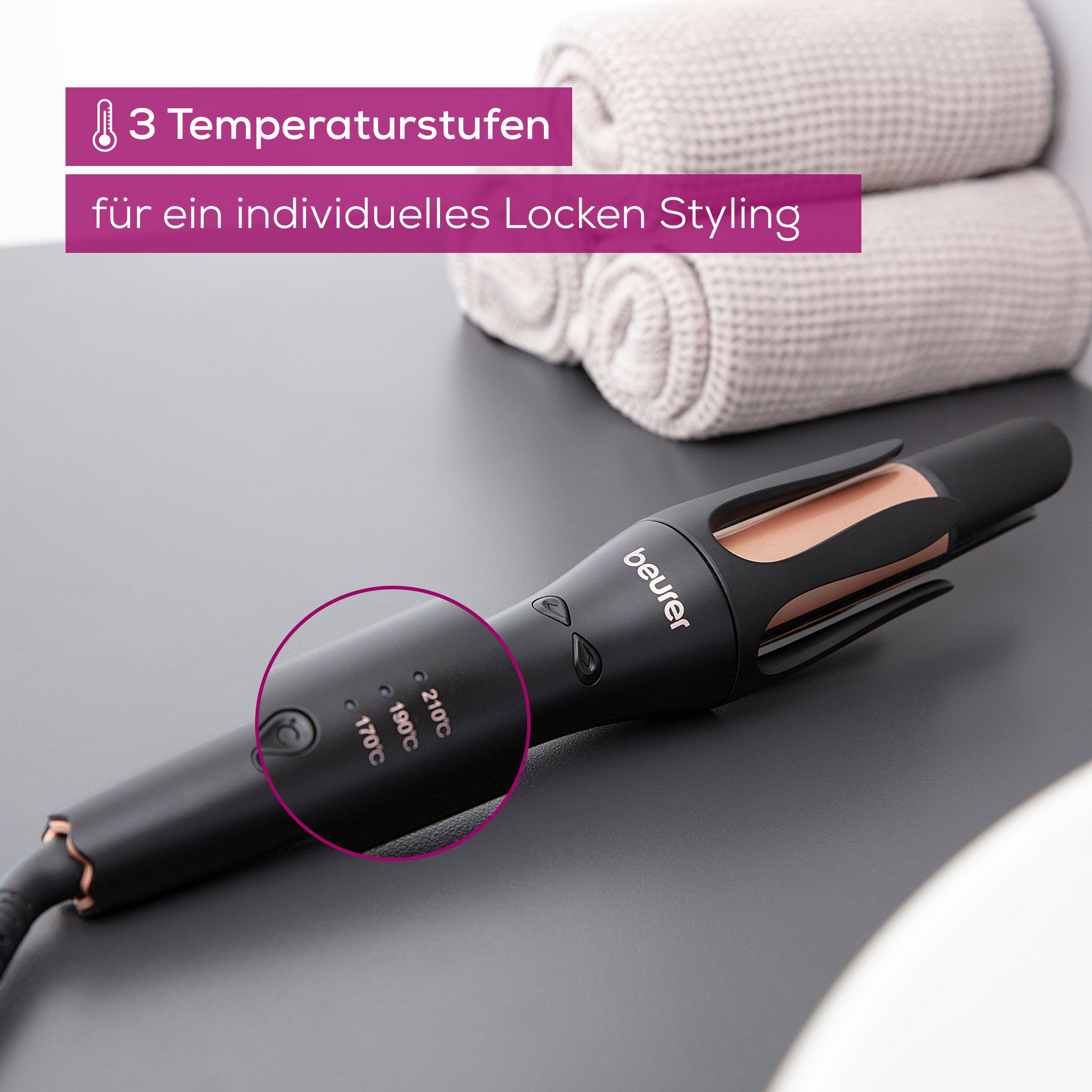 Ein schwarzer Lockenstab mit drei Temperatureinstellungen (170-210°C).