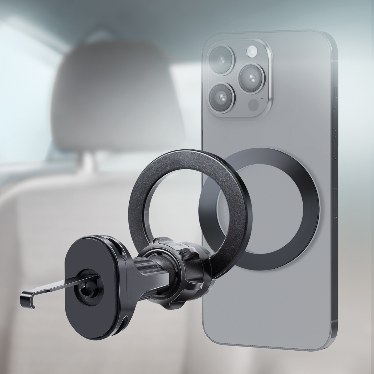 Ein schwarzer Handyhalter mit einem Ring ist an einem Auto-Sitz befestigt.