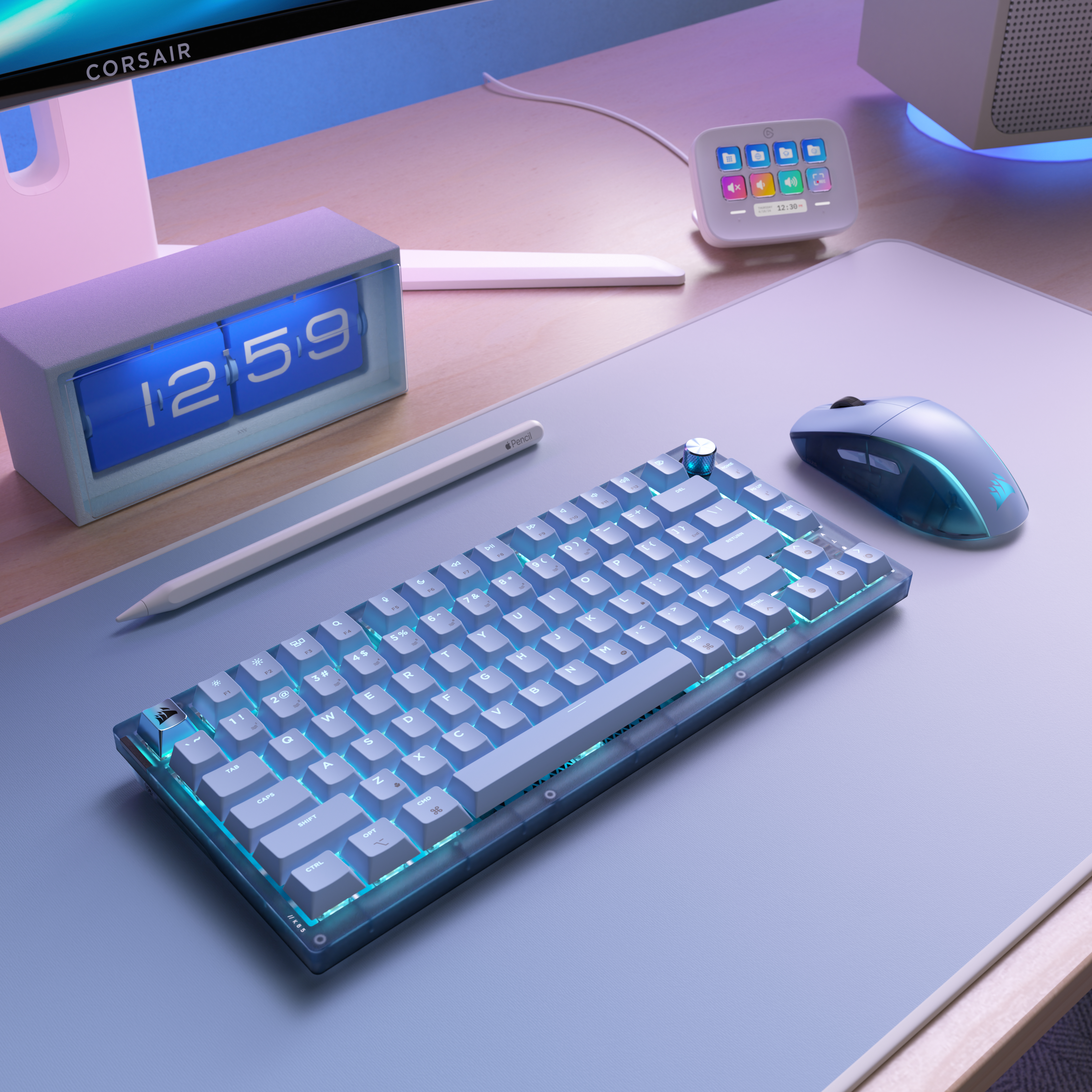 Ein leuchtend blaues Tastatur- und Mausset auf einer Matte mit einem Flip-Clock-Wecker.