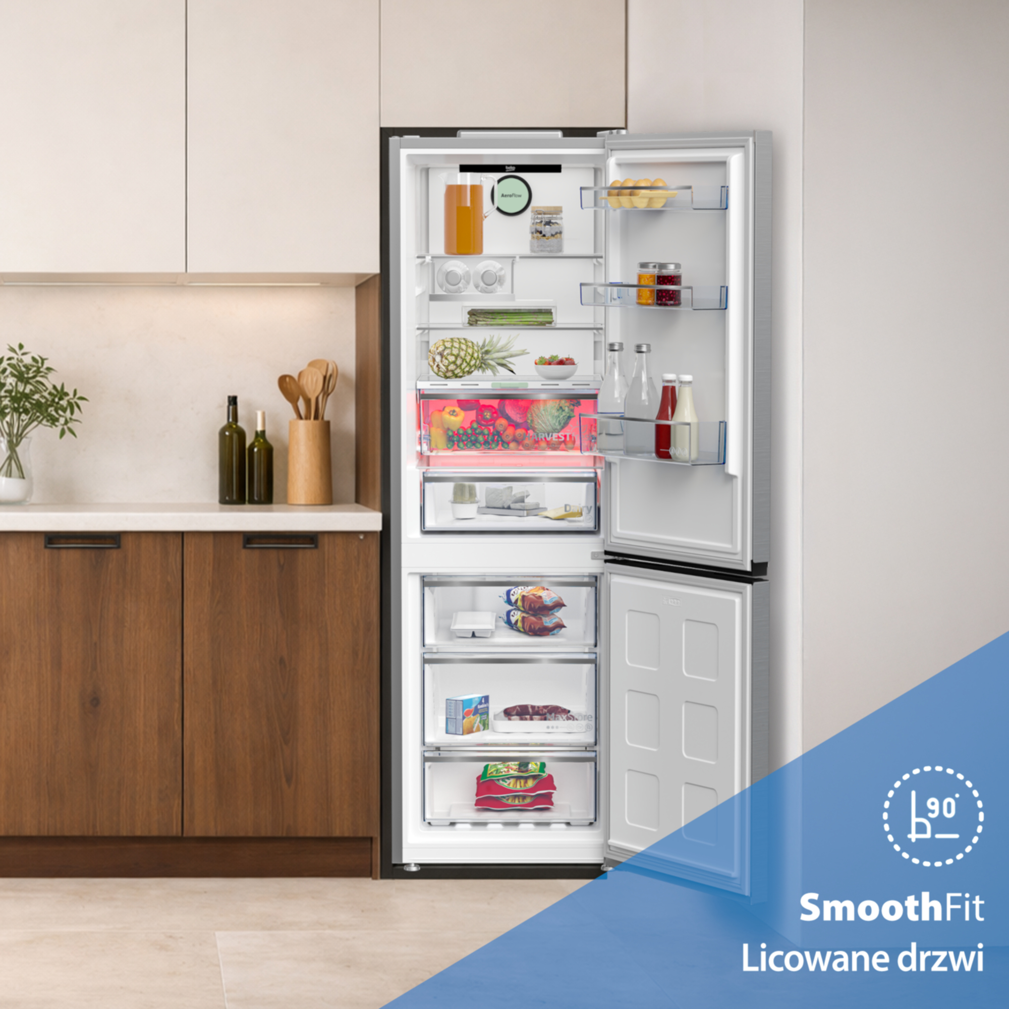 Otwarta lodówka z jedzeniem, w tym owocami, warzywami, jajkami i napojami.