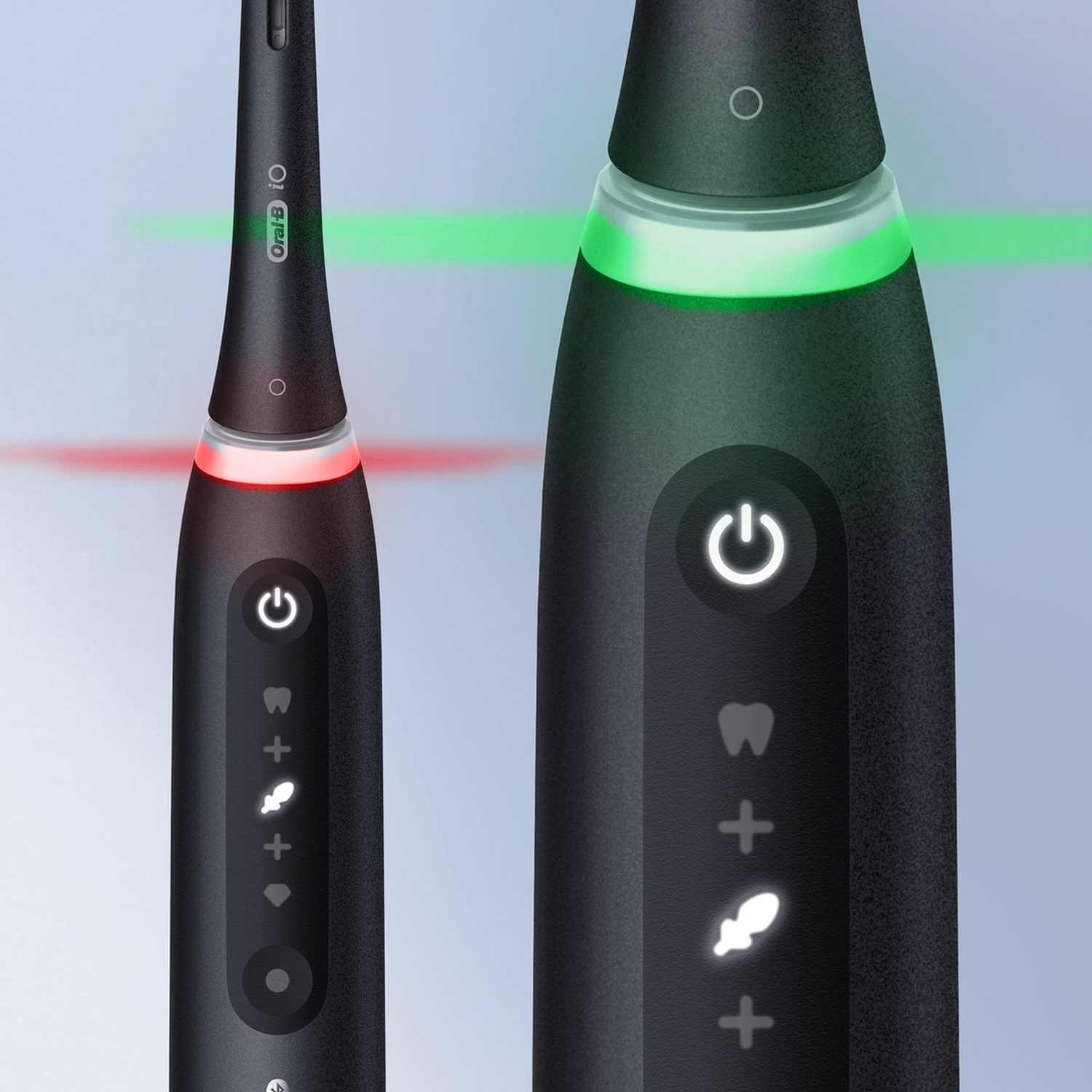 Zwarte elektrische tandenborstel met gloeiende rode en groene lichten en iconen.