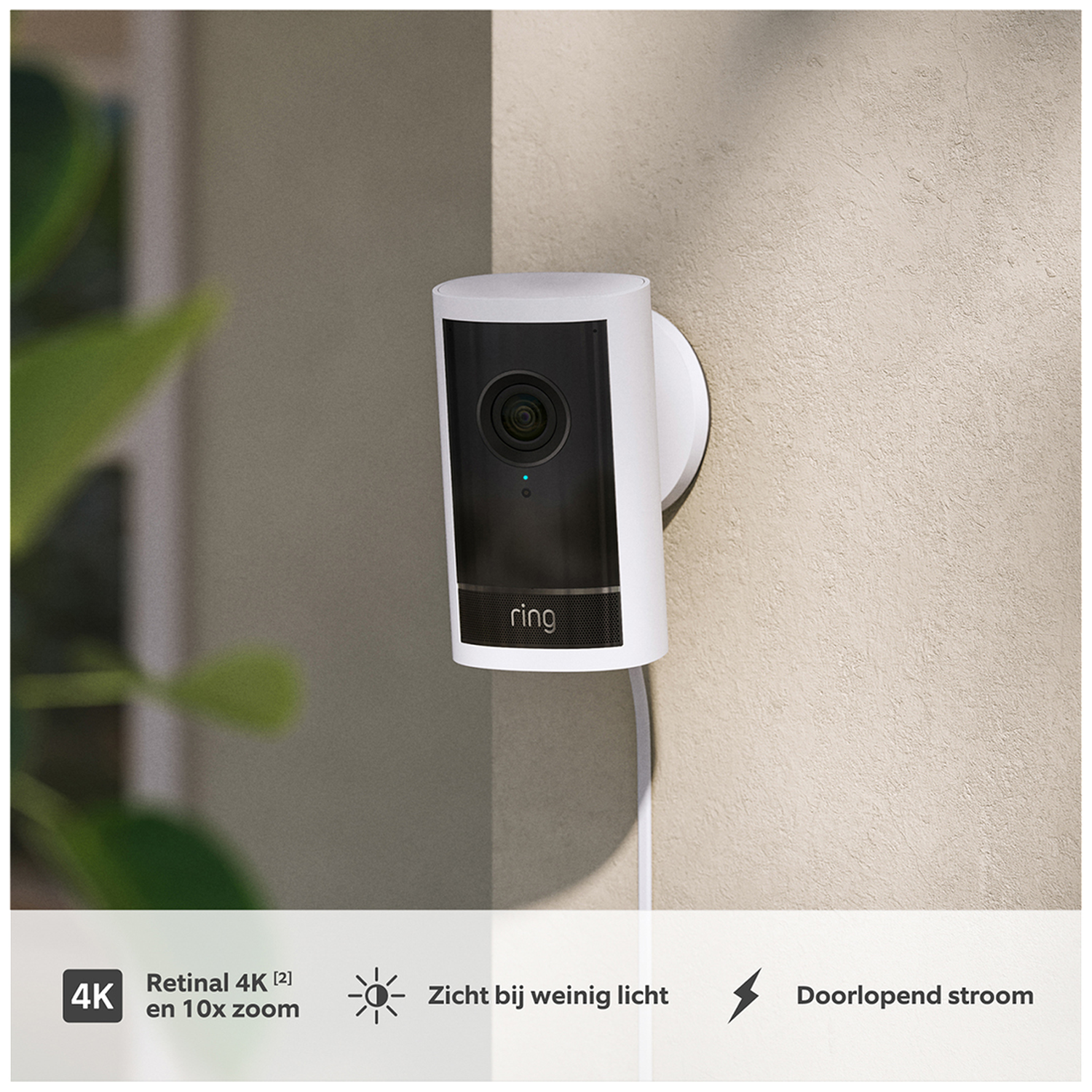 Ring camera mounted on a wall, featuring 4K resolution and night vision.