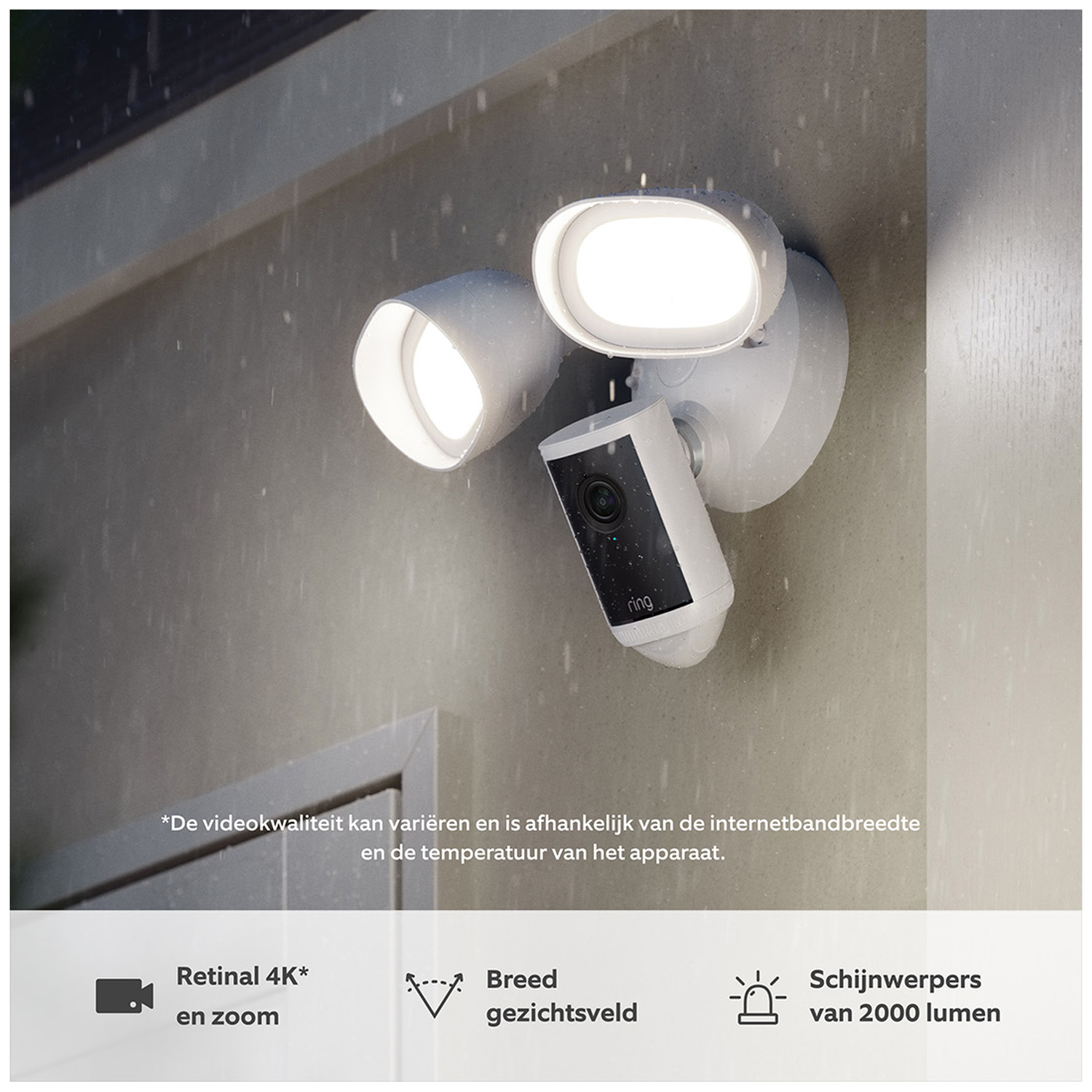A white Ring floodlight with camera in the rain.