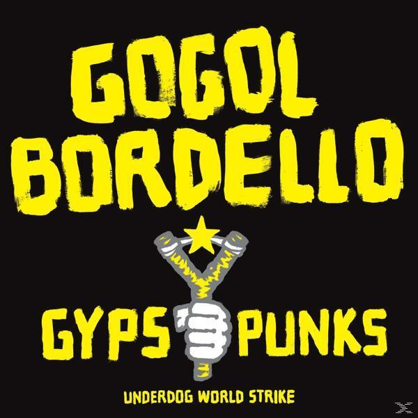 Gogol Bordello, Gypsys, Punks, Underdog World Strike felirat parittyával.