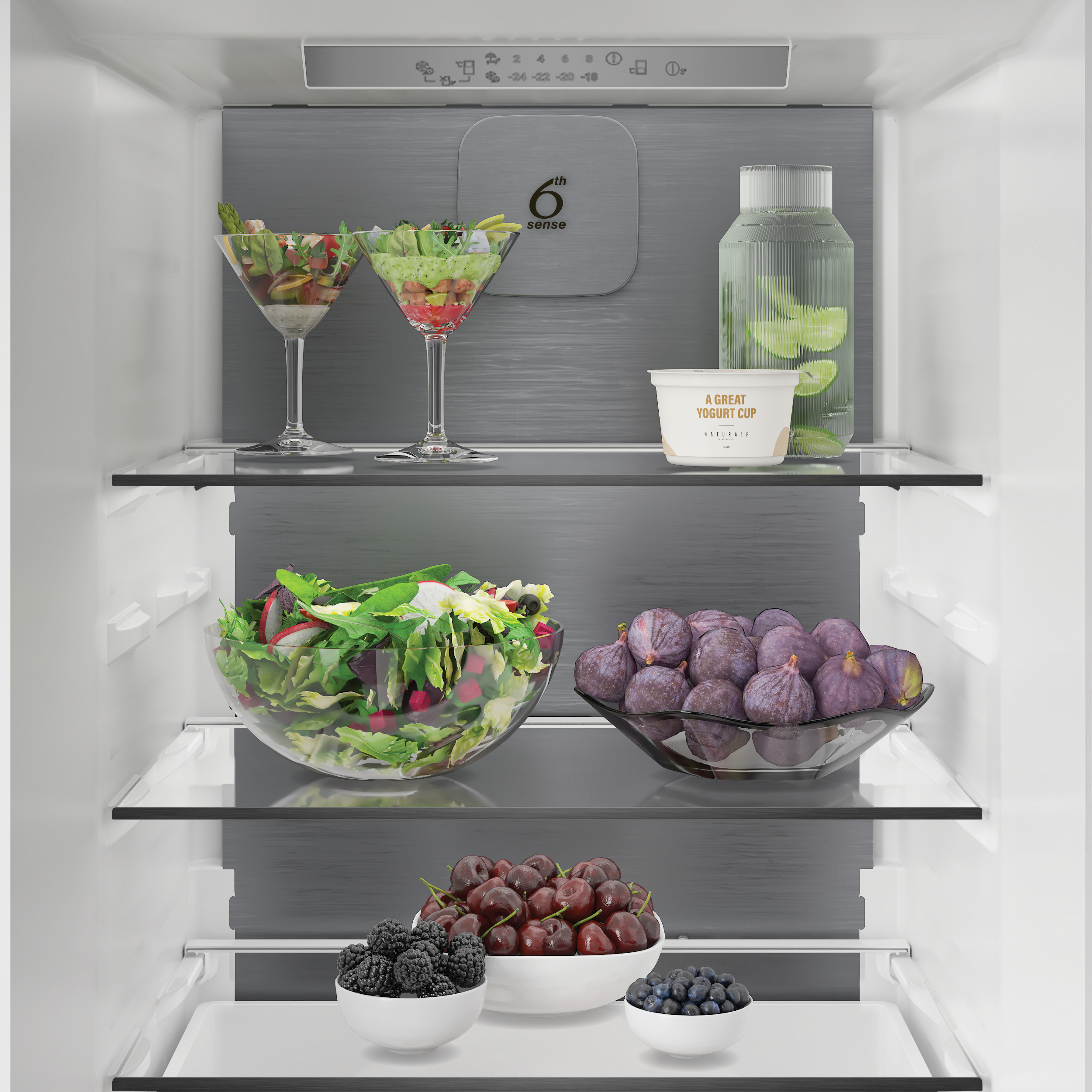 Wnętrze lodówki z owocami, sałatką i jogurtem na półkach.