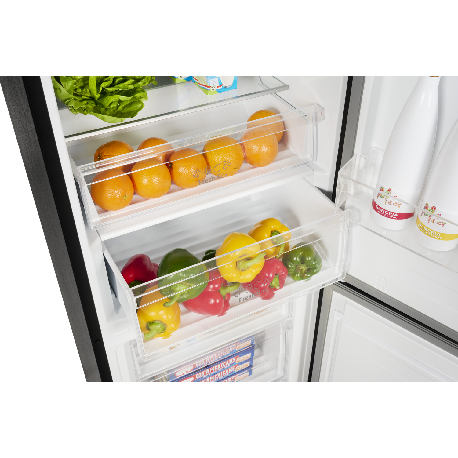 Refrigerator interior with oranges, bell peppers, lettuce, and sangria bottles.