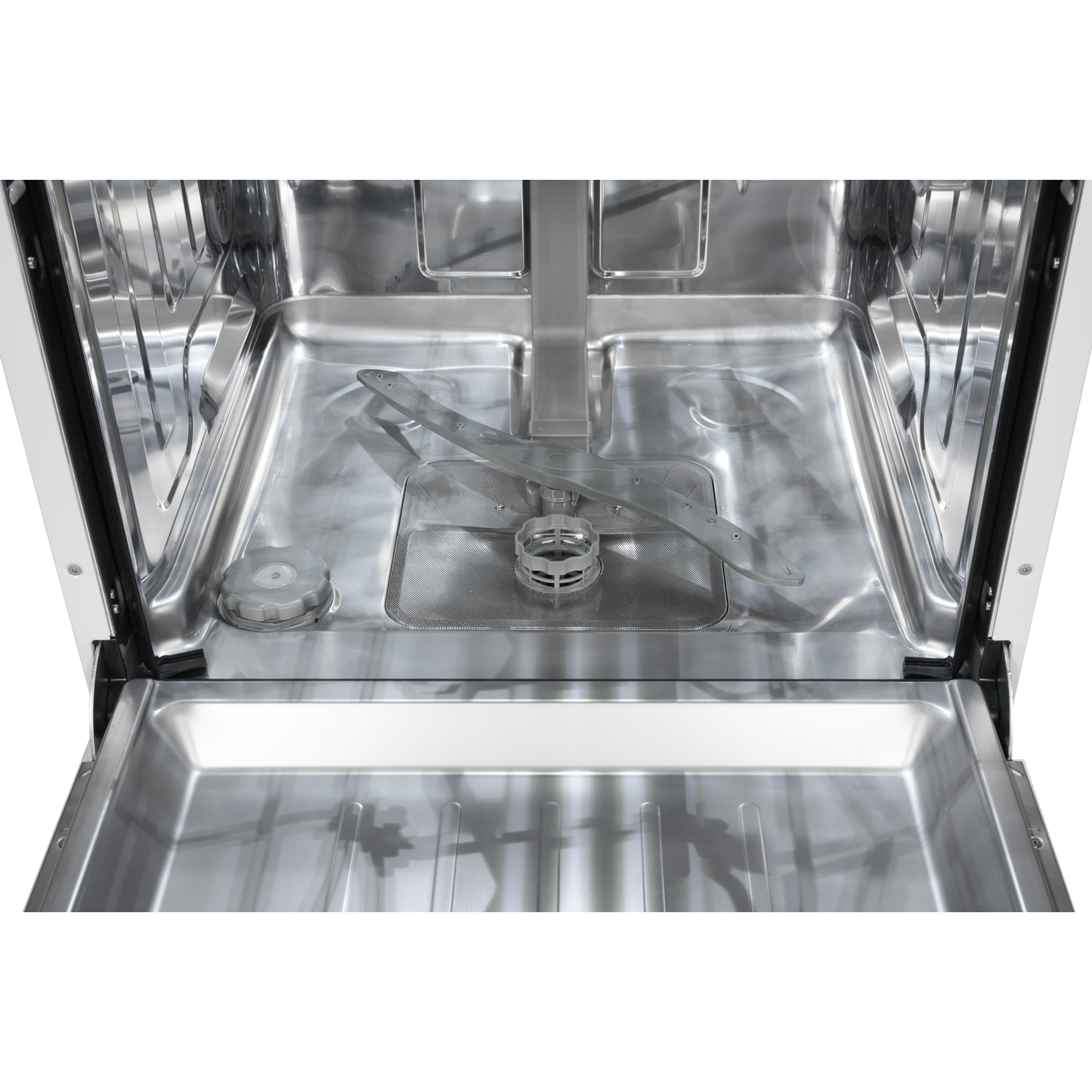 Interior of a dishwasher with spray arm and detergent compartment.