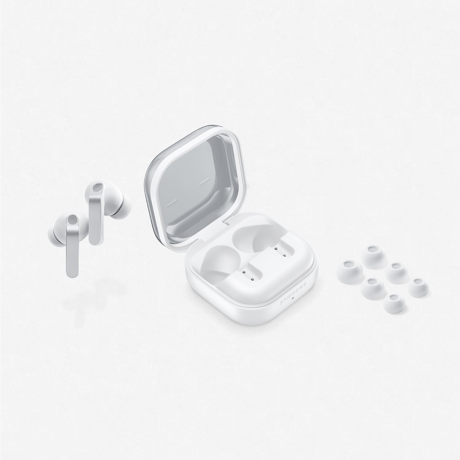 Auriculares blancos, estuche de carga y almohadillas en fondo blanco.