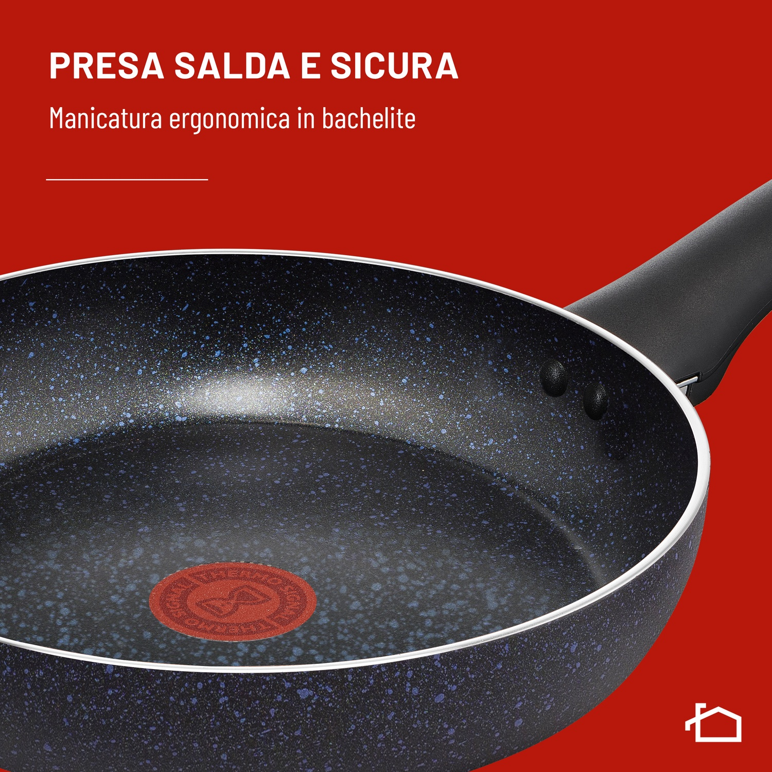 Padella scura con manico ergonomico e Thermo-Spot rosso.