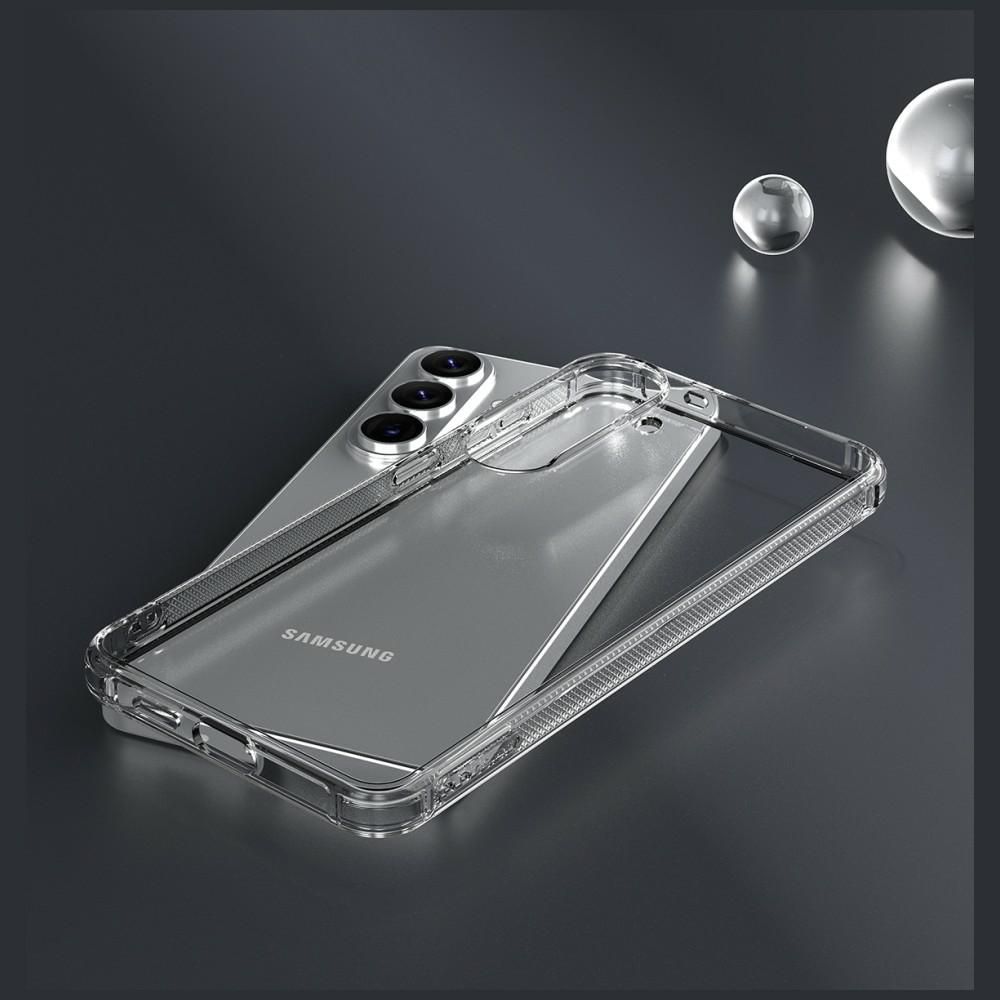 Przezroczyste etui na telefon leży na srebrnym telefonie Samsung.