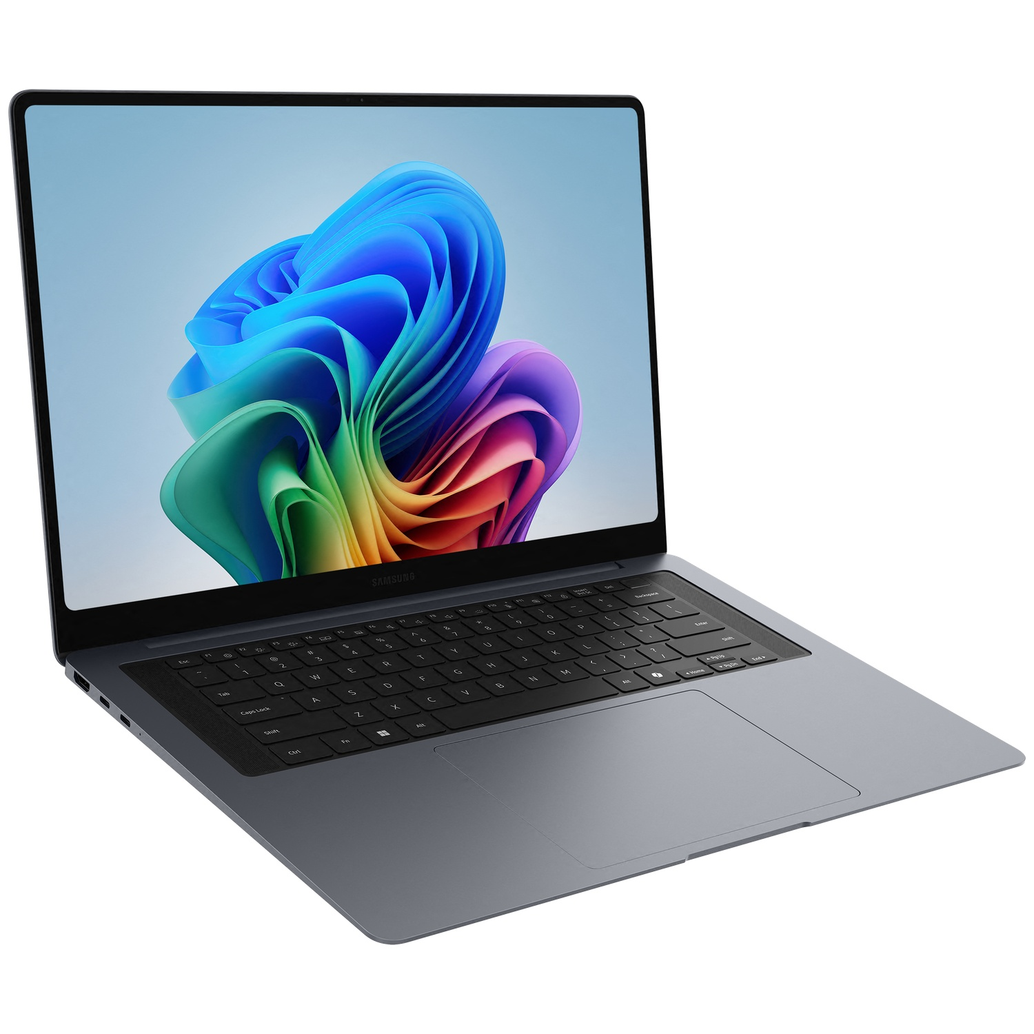 Un ordinateur portable gris foncé est ouvert, affichant une image abstraite colorée sur son écran. Clavier visible.