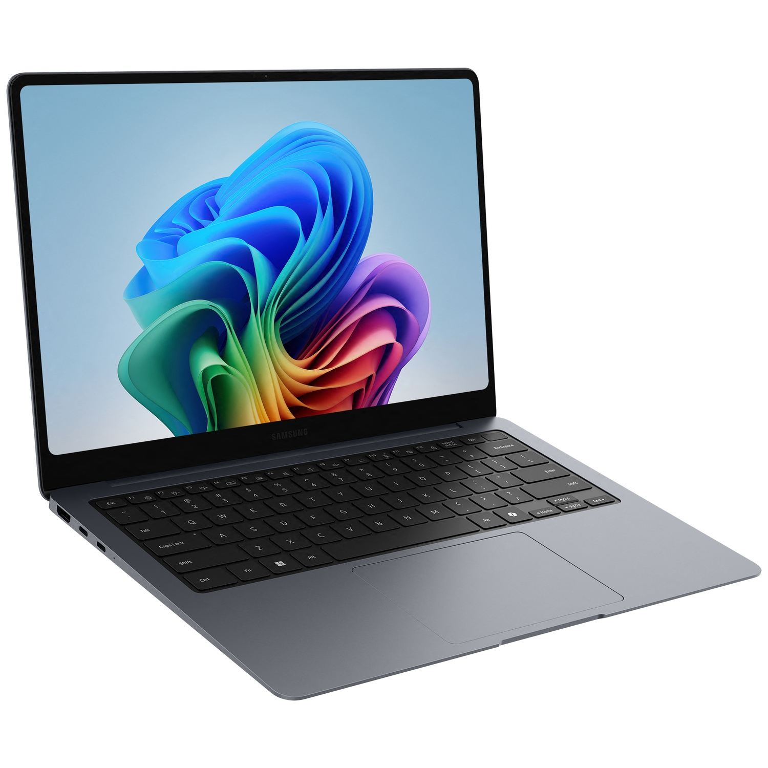 Un ordinateur portable Samsung gris affichant une image abstraite colorée.