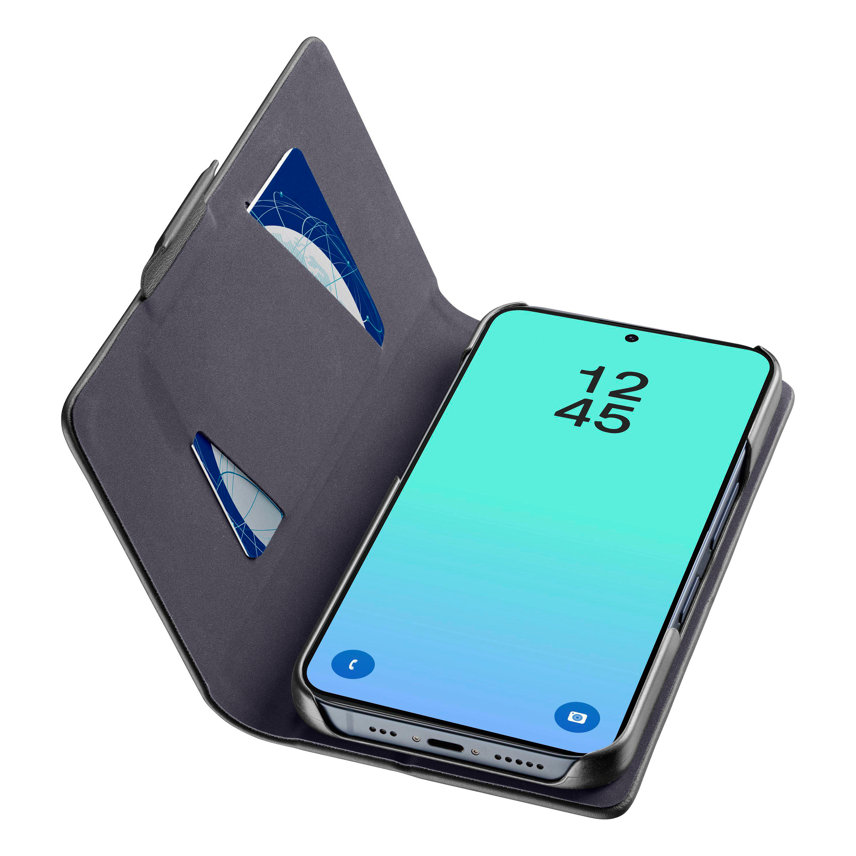 Ein graues Flip-Case mit Kartenfächern und einem Smartphone mit blau-grünem Display.