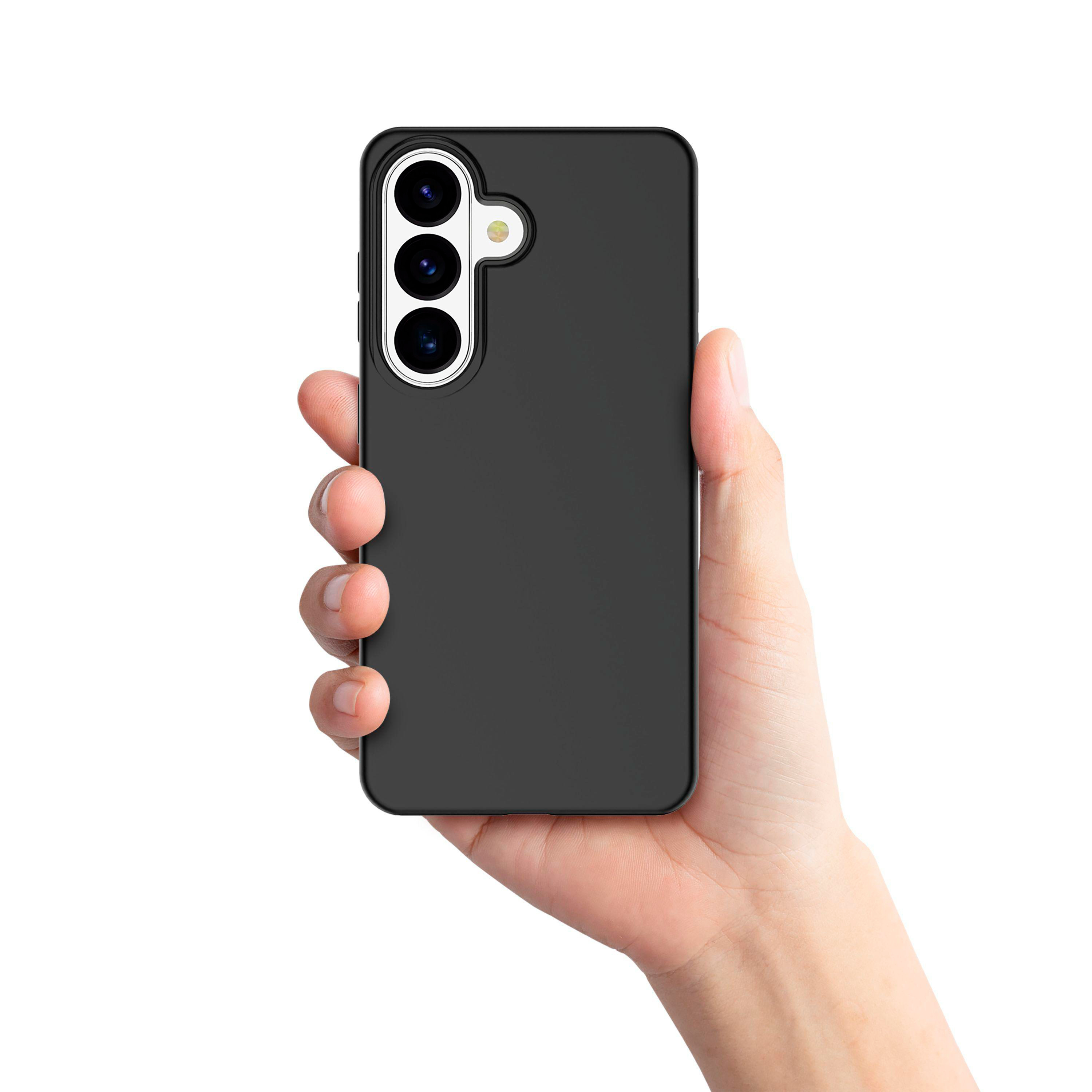 Eine Hand hält ein schwarzes Smartphone mit drei Kameras.