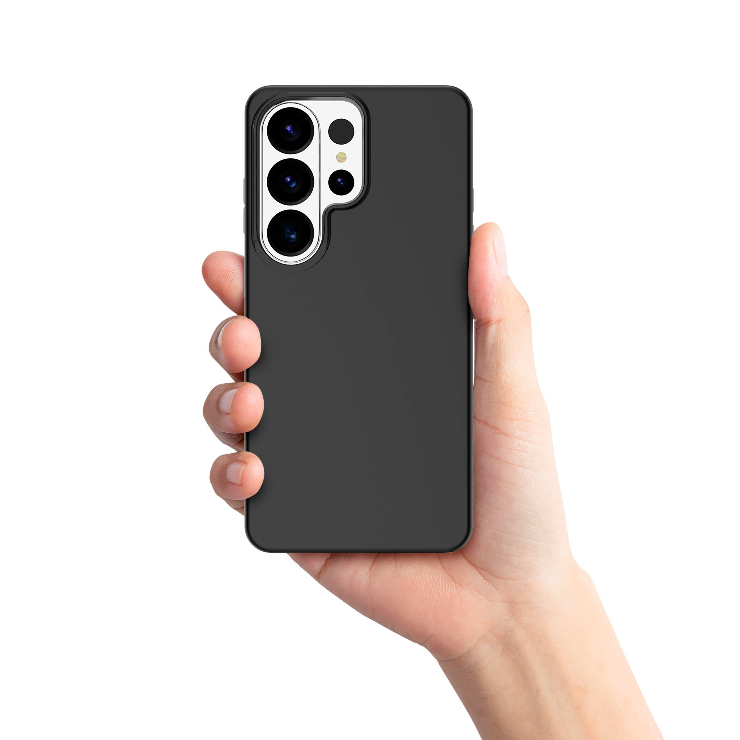 Eine Hand hält ein schwarzes Smartphone mit vier Kameralinsen.