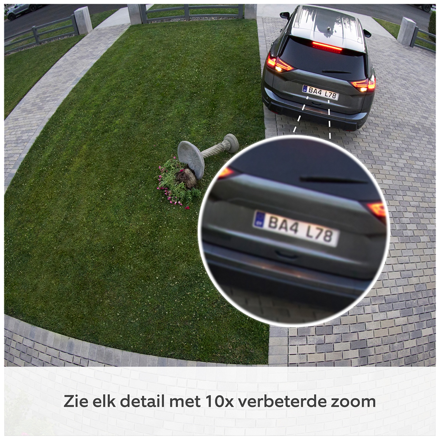 Een donkere auto met kenteken BA4 L78 staat op een betegelde oprit.
