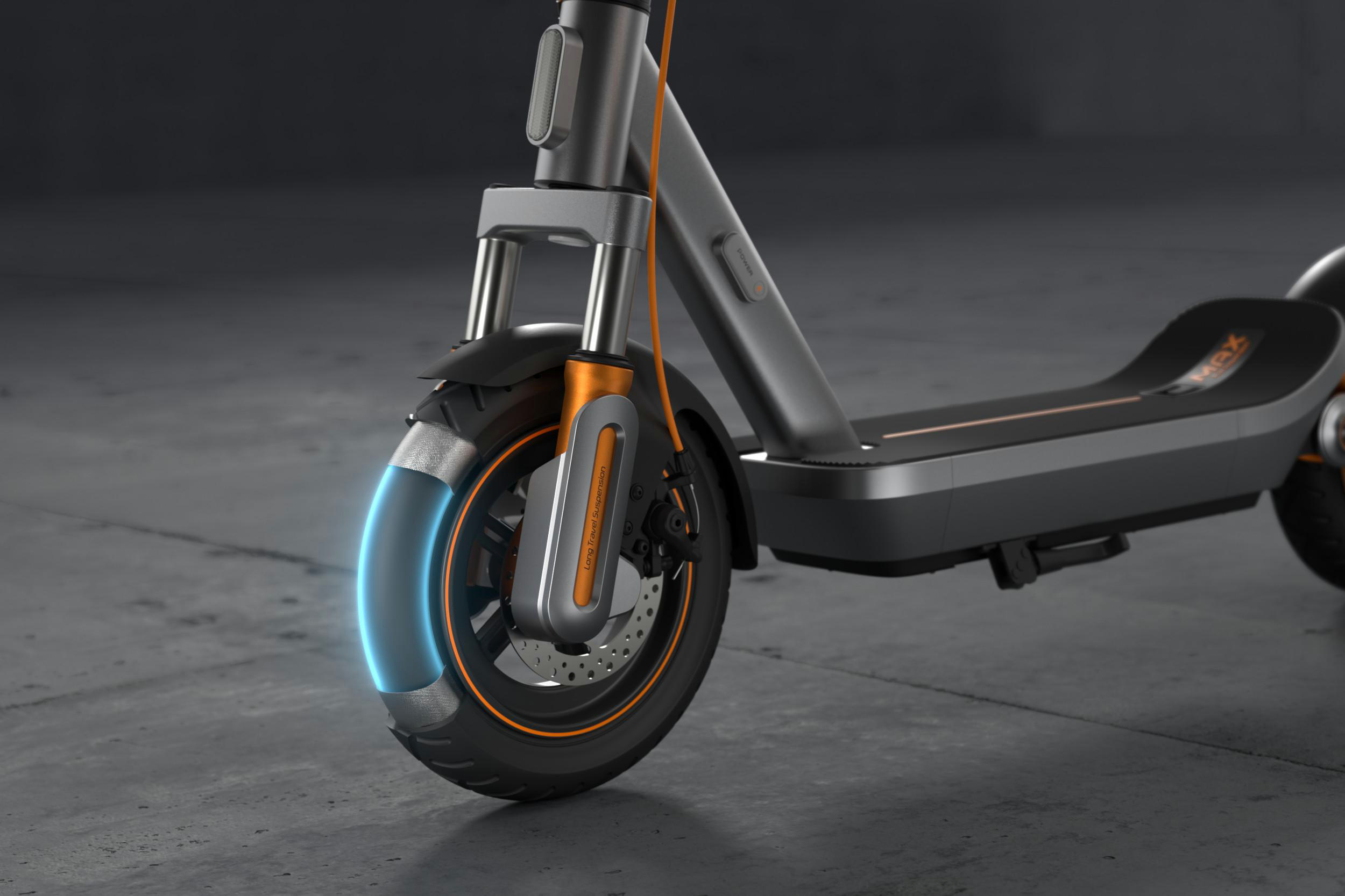 Grauer Elektroroller mit orangen Akzenten und blauer Radbeleuchtung.