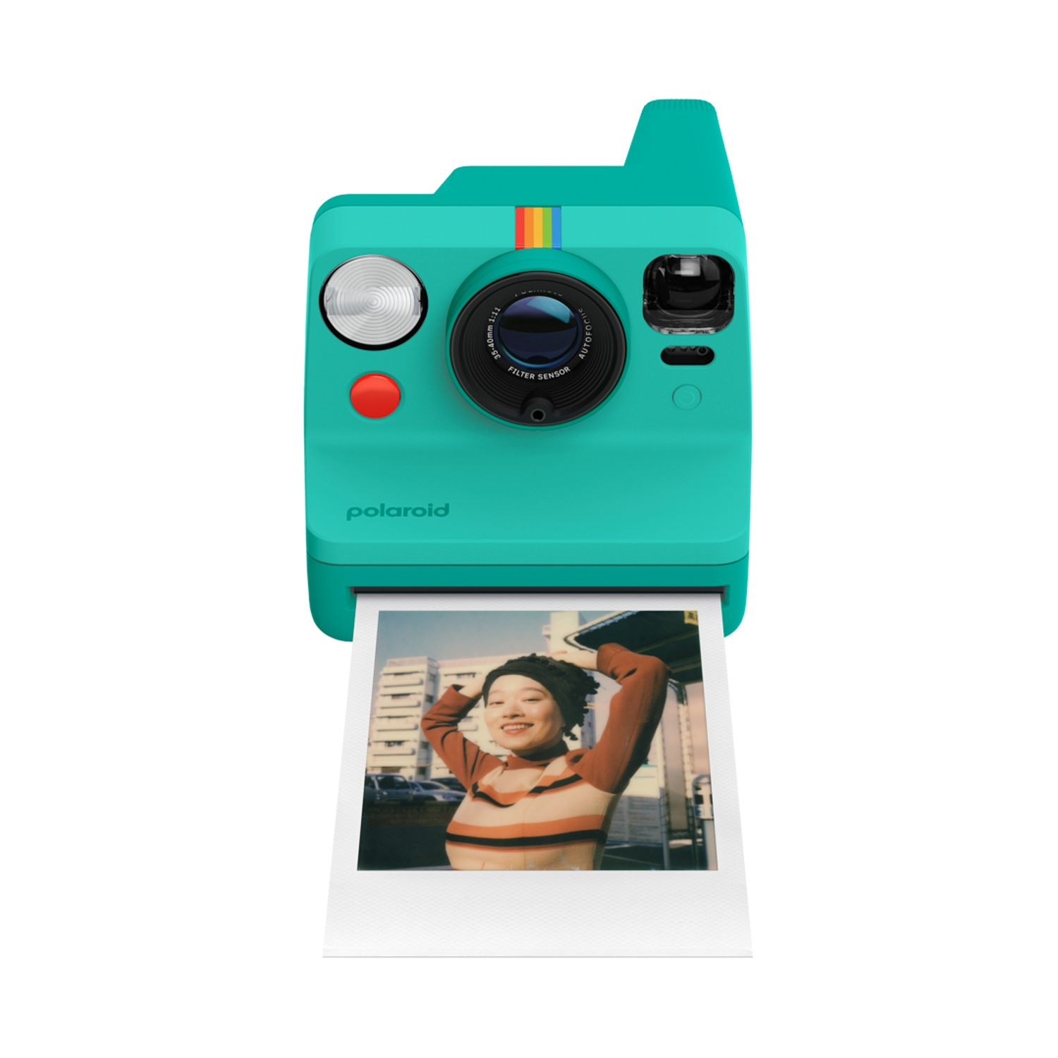 Fotocamera Polaroid blu petrolio stampa una foto di una giovane donna sorridente.
