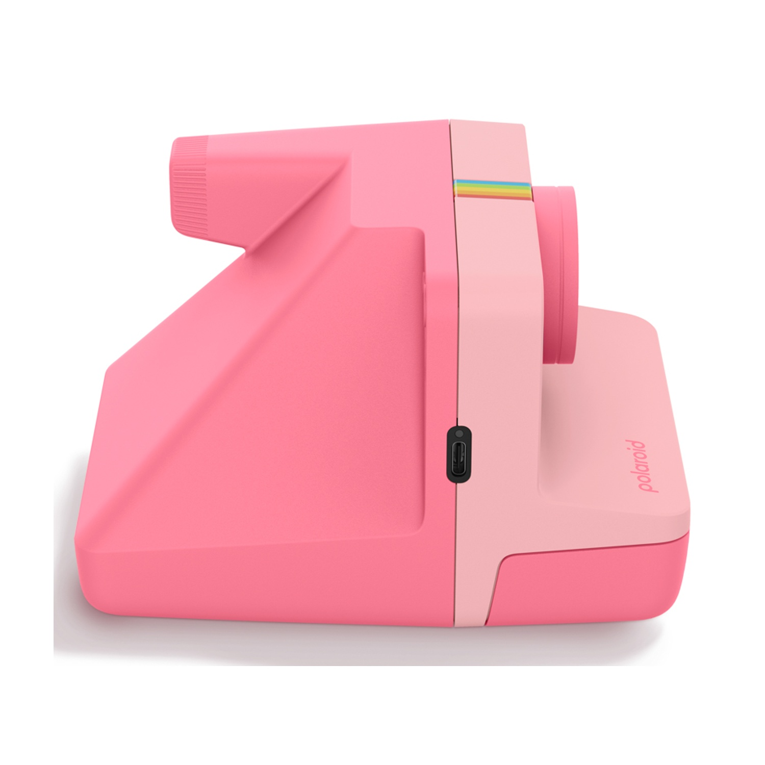 Una fotocamera Polaroid rosa con accento arcobaleno e porta USB.