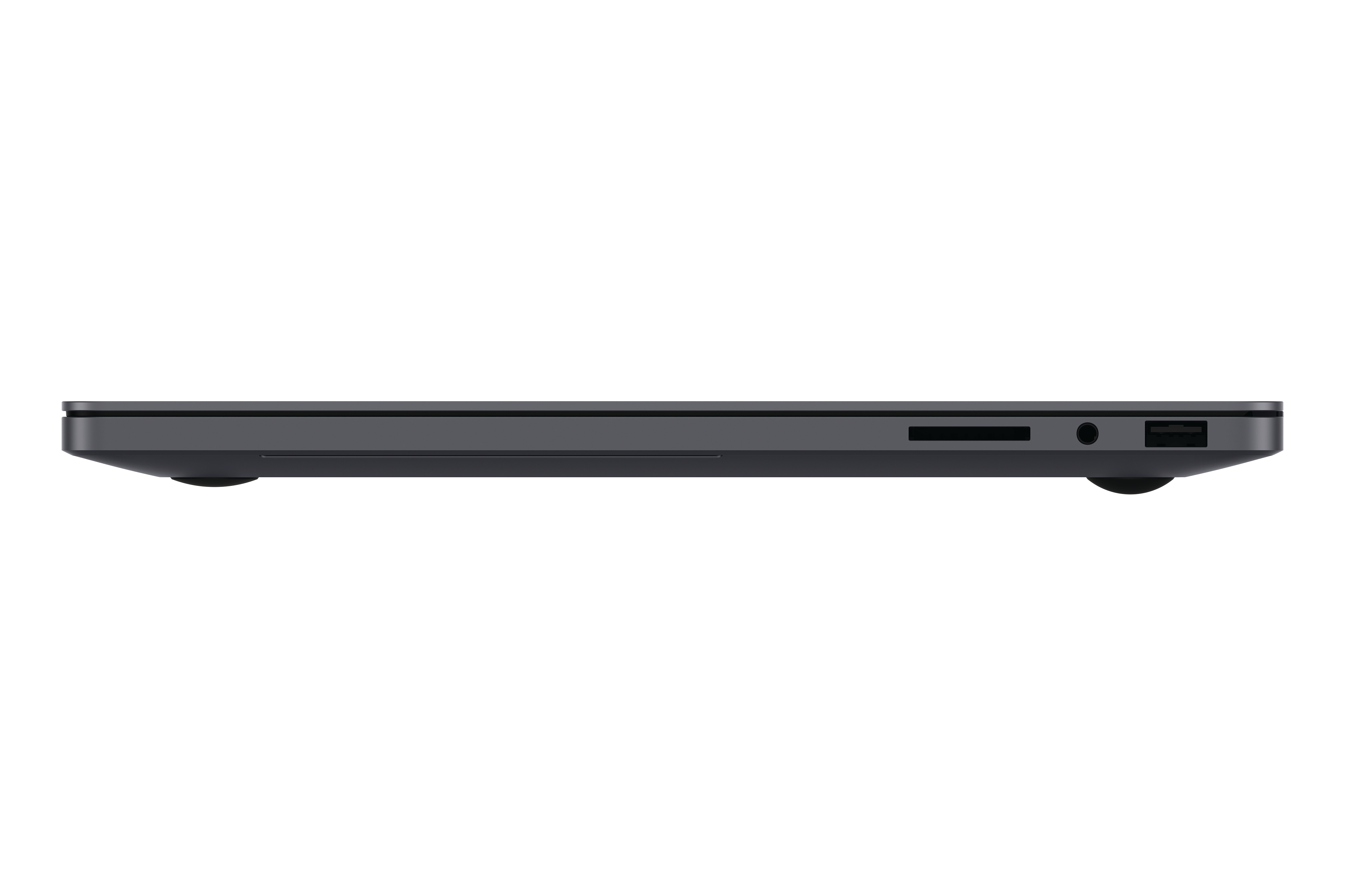 Draufsicht einer dunklen Laptoptastatur mit Anschlüssen: SD-Kartenleser, Kopfhörerbuchse, USB.