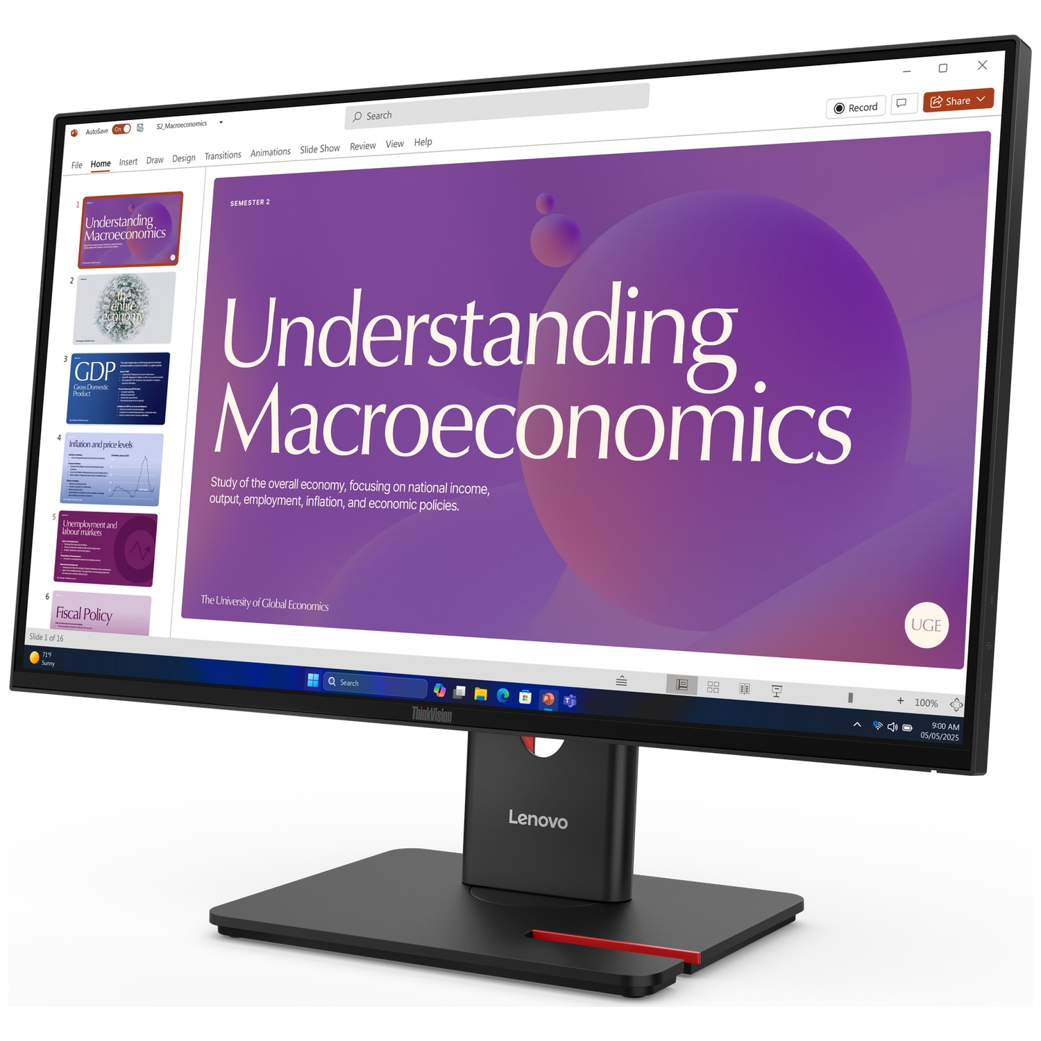 A monitor displays a presentation on Macroeconomics with purple and abstract shapes.