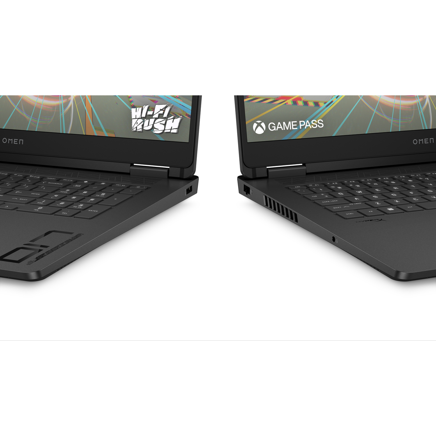 Two black laptops with glowing screens. One displays 'Hi-Fi Rush', the other 'Game Pass'.