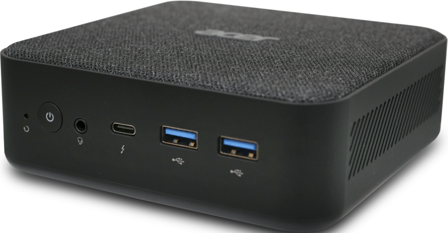 Kleiner schwarzer Computer mit Stoffoberseite, Frontanschlüssen: Power, Audio, USB-C, 2x USB.