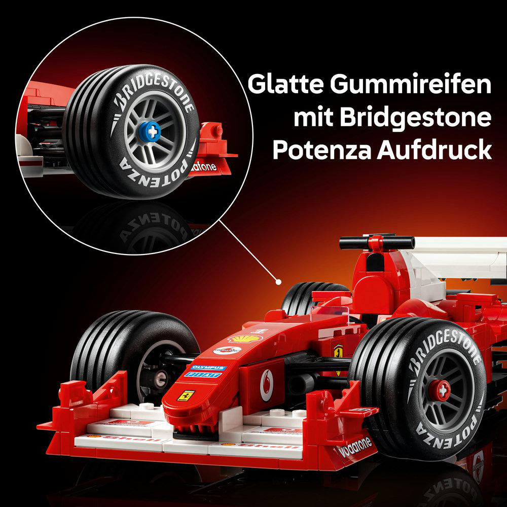 Rotes Formel-1-Auto mit Bridgestone Reifen und Aufdruck.
