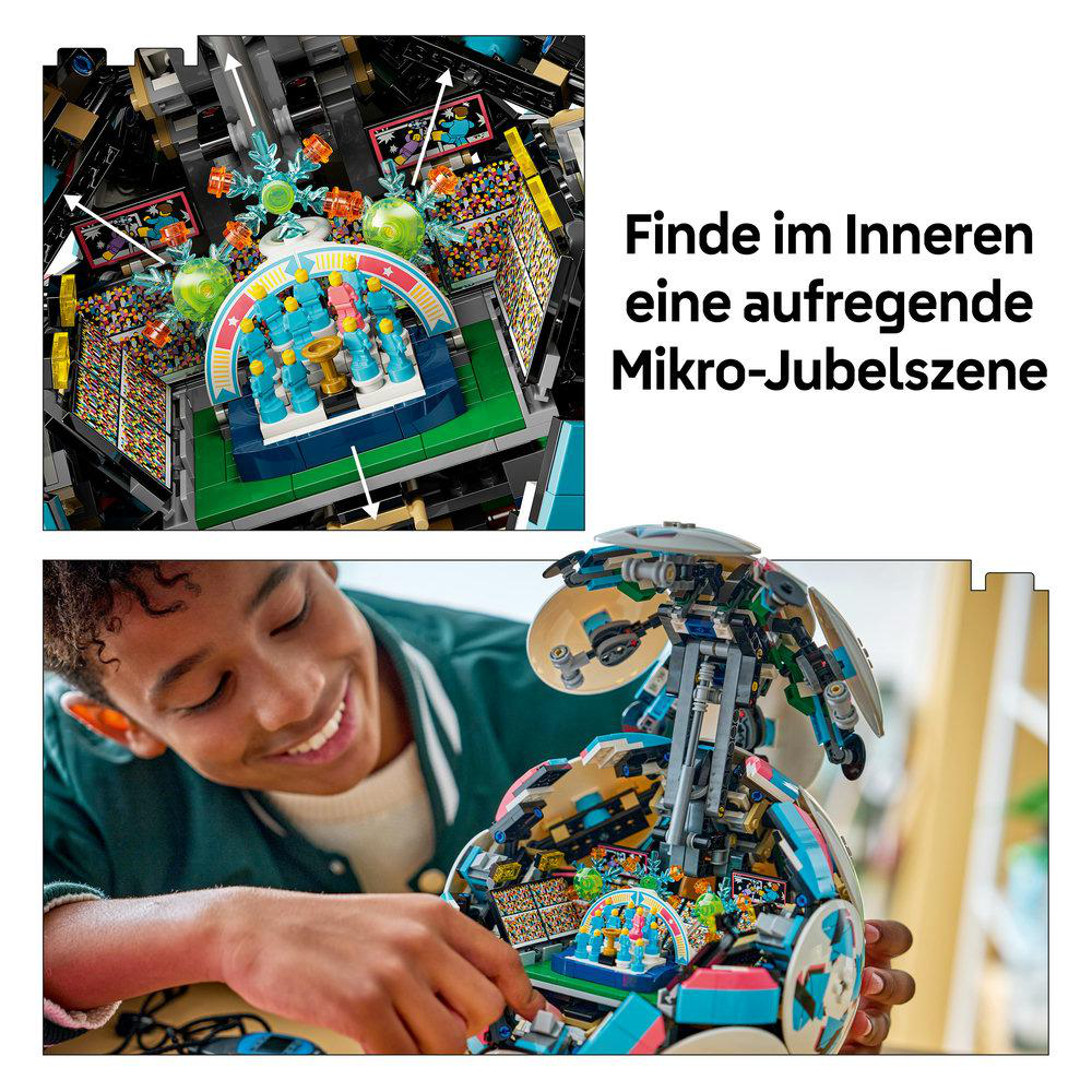 Ein Junge baut ein buntes Lego-Modell mit einer Mikro-Jubel-Szene.