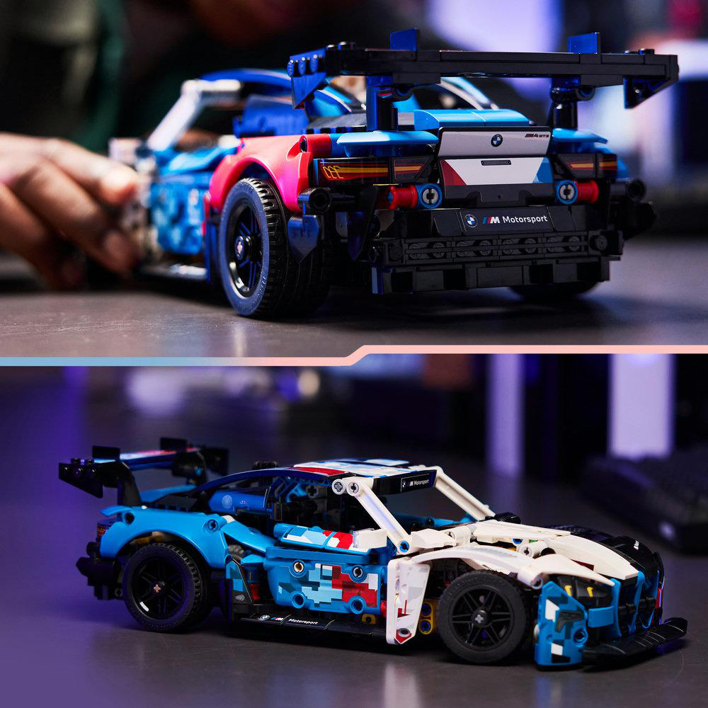Ein blauer Lego-Rennwagen mit weißen und roten Akzenten und einem Heckspoiler.